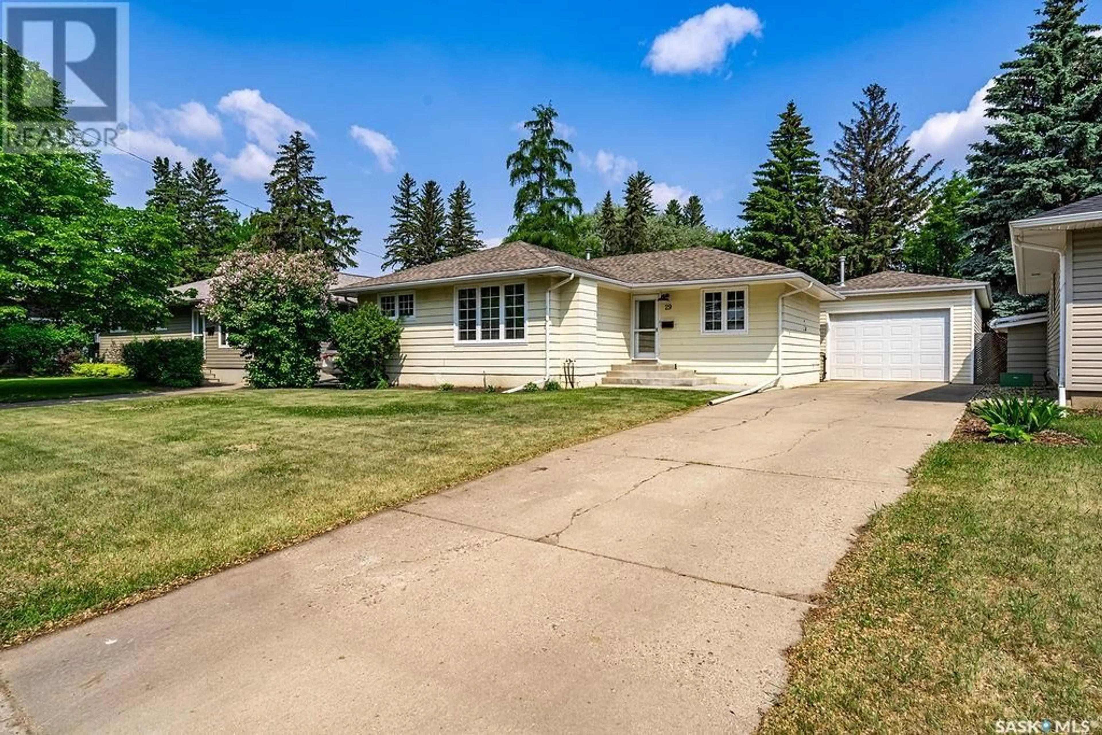 Home with vinyl exterior material, street for 29 NORMAN CRESCENT, Saskatoon Saskatchewan S7J2K4