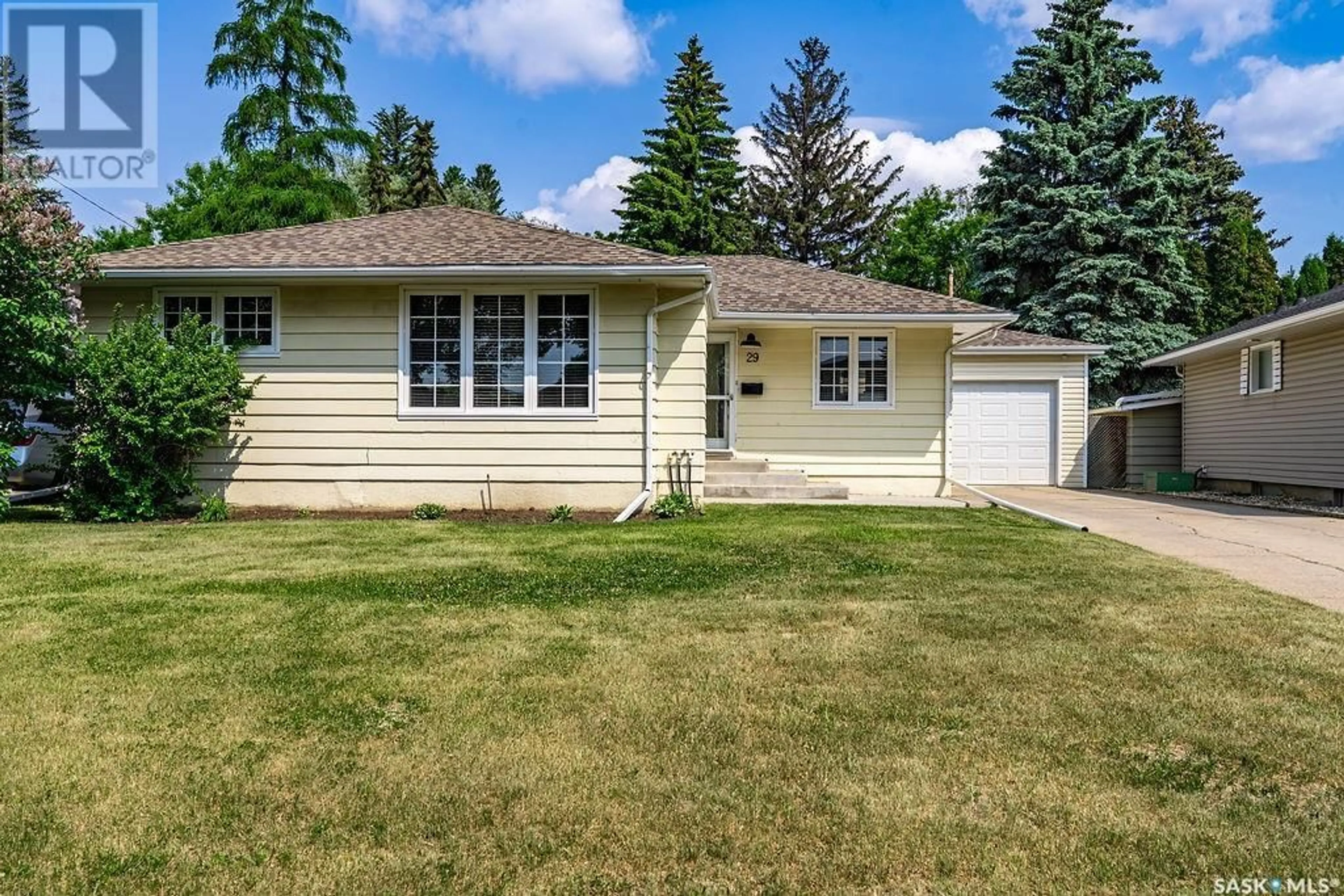 Home with vinyl exterior material, street for 29 NORMAN CRESCENT, Saskatoon Saskatchewan S7J2K4