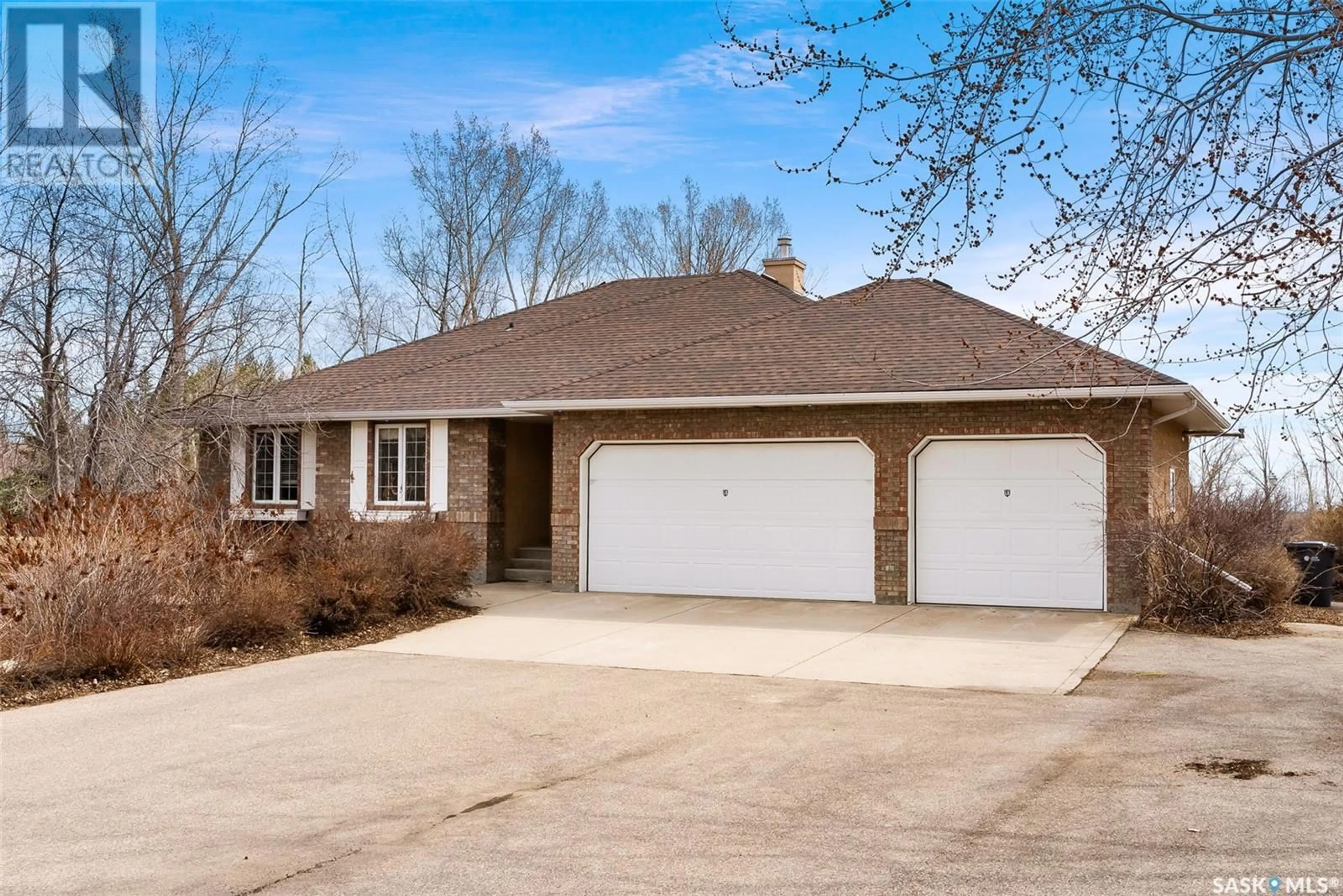 Home with brick exterior material, street for 12 PARK MEADOWS ROAD, Edenwold Rm No. 158 Saskatchewan S4L5B1