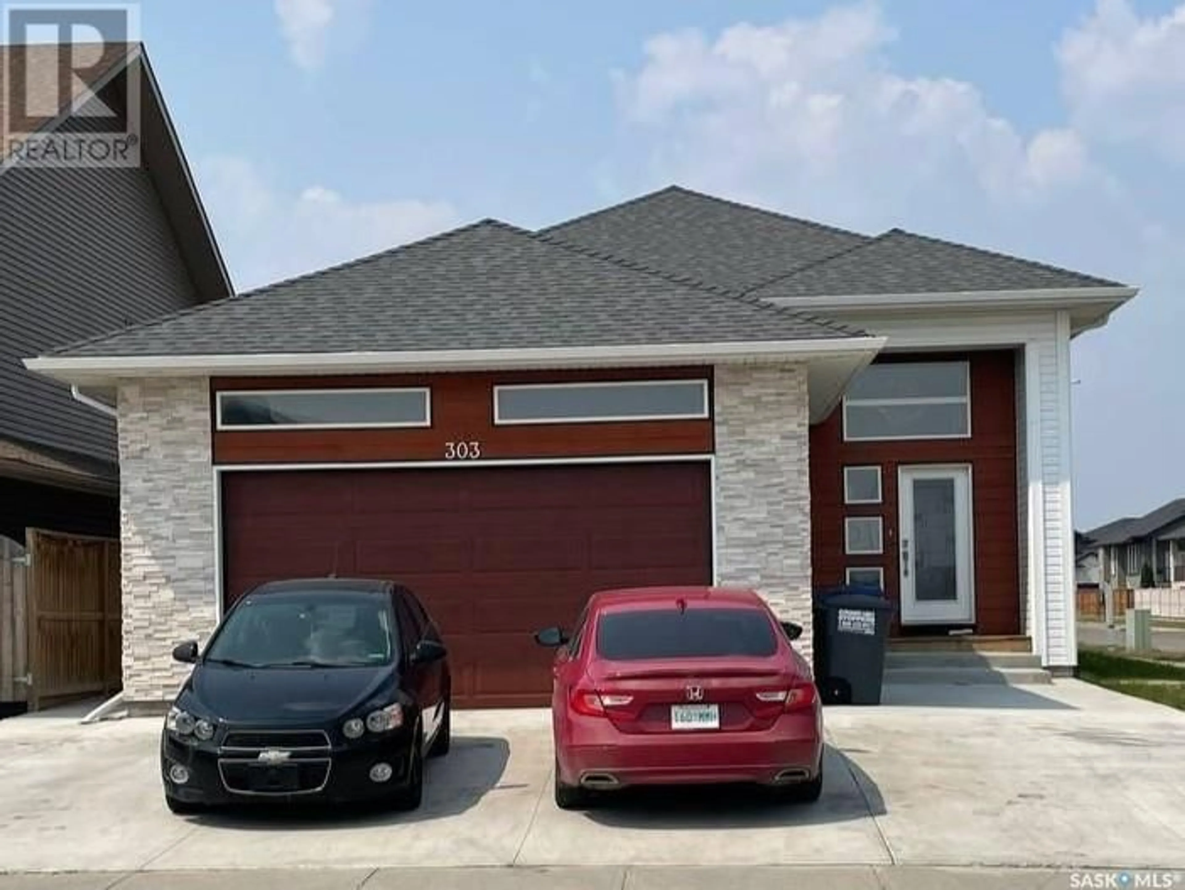 Home with brick exterior material, street for 303 GILLIES CRESCENT, Saskatoon Saskatchewan S7V0J9