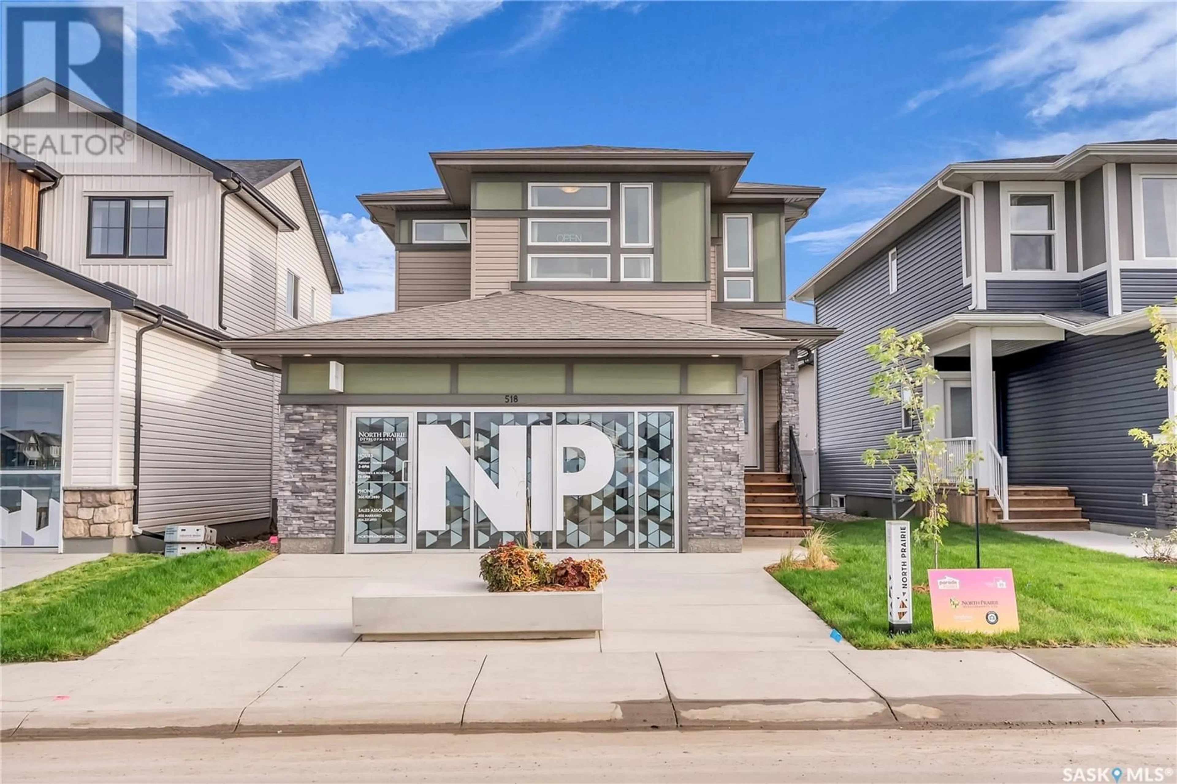 Home with vinyl exterior material, street for 518 ANISKOTAW WAY, Saskatoon Saskatchewan S7V1M2