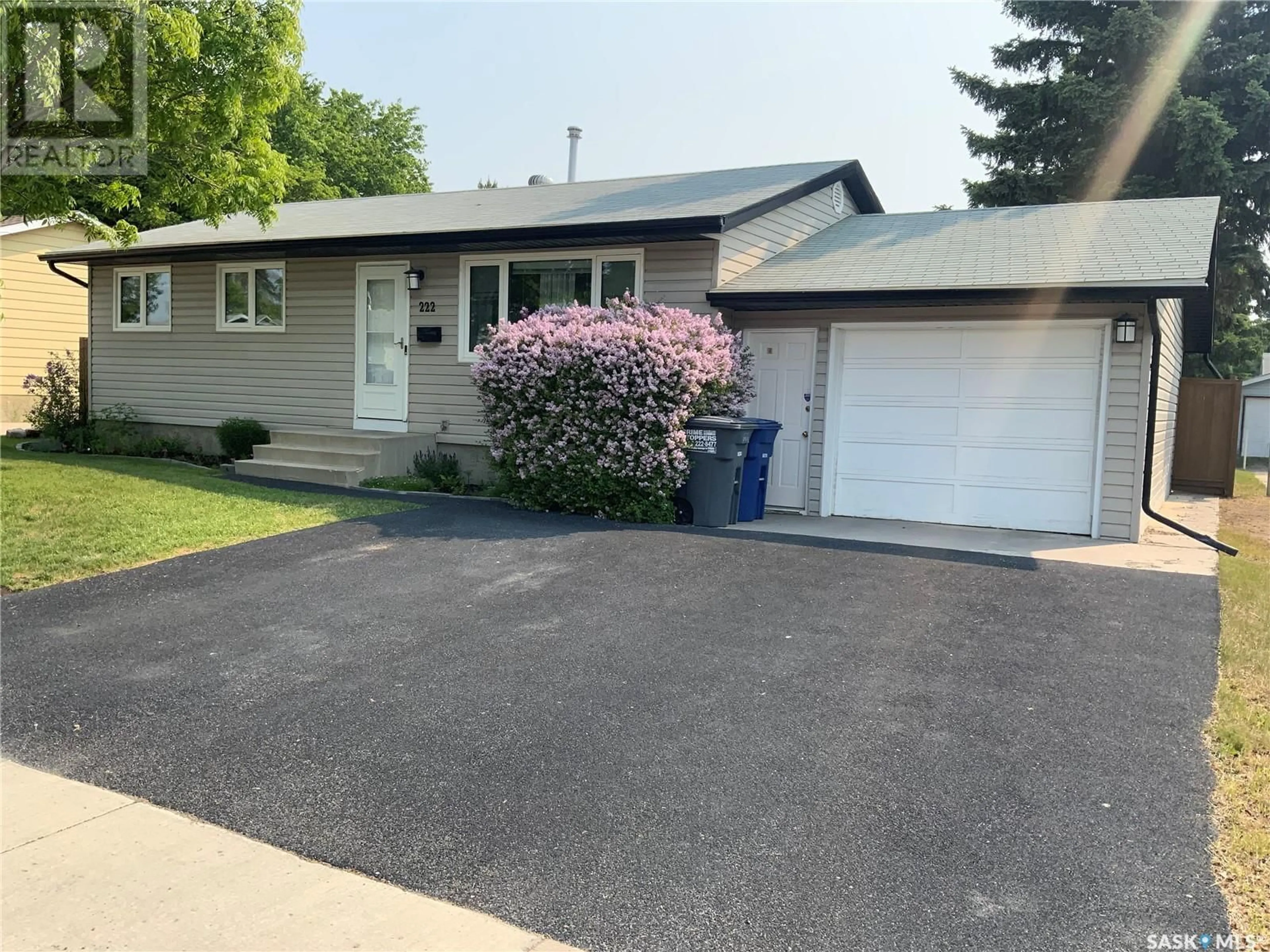 Home with vinyl exterior material, street for 222 SHEA CRESCENT, Saskatoon Saskatchewan S7L5M3