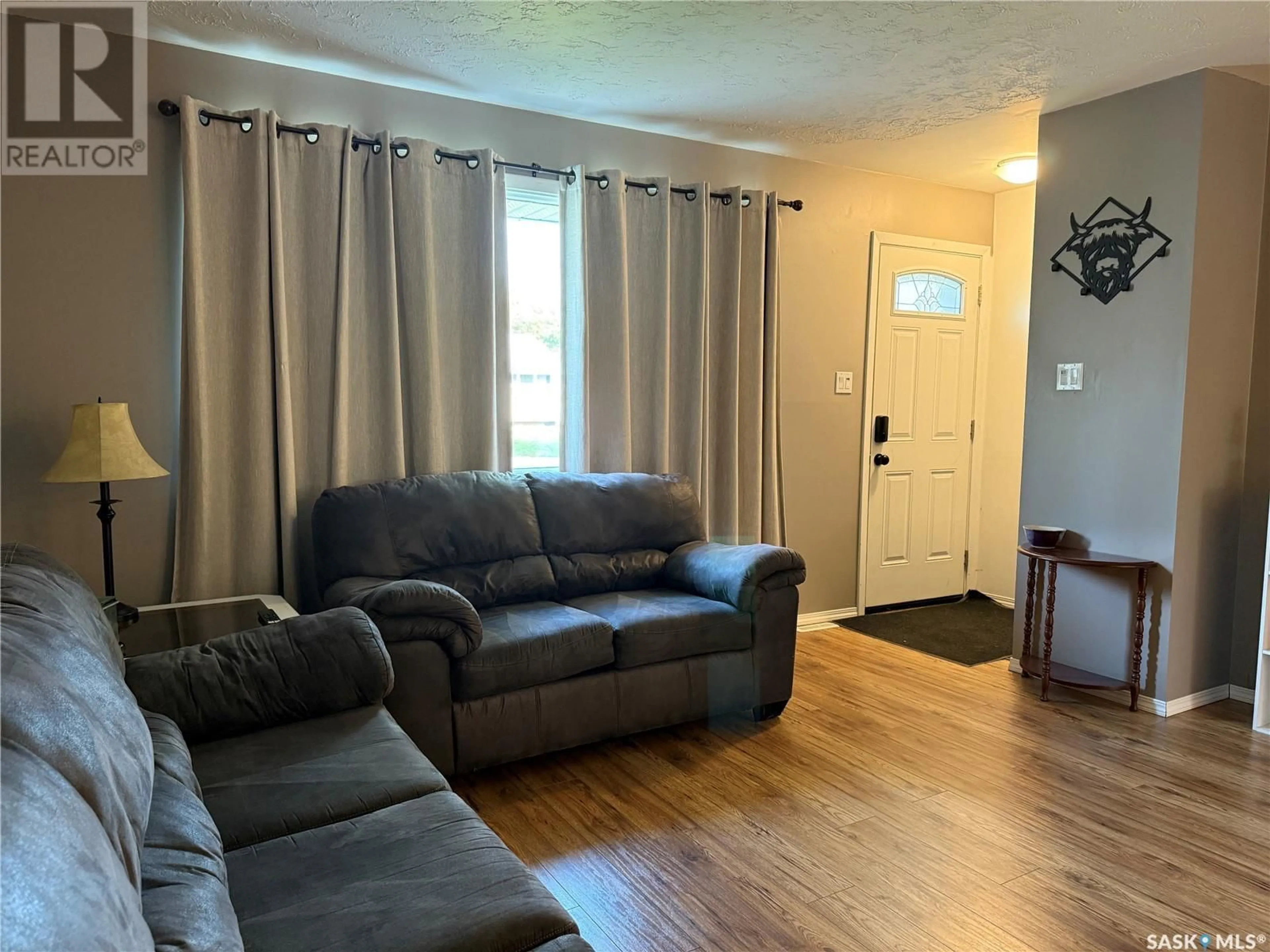 Living room with furniture, unknown for 1321 CONNAUGHT AVENUE, Moose Jaw Saskatchewan S6H4B9