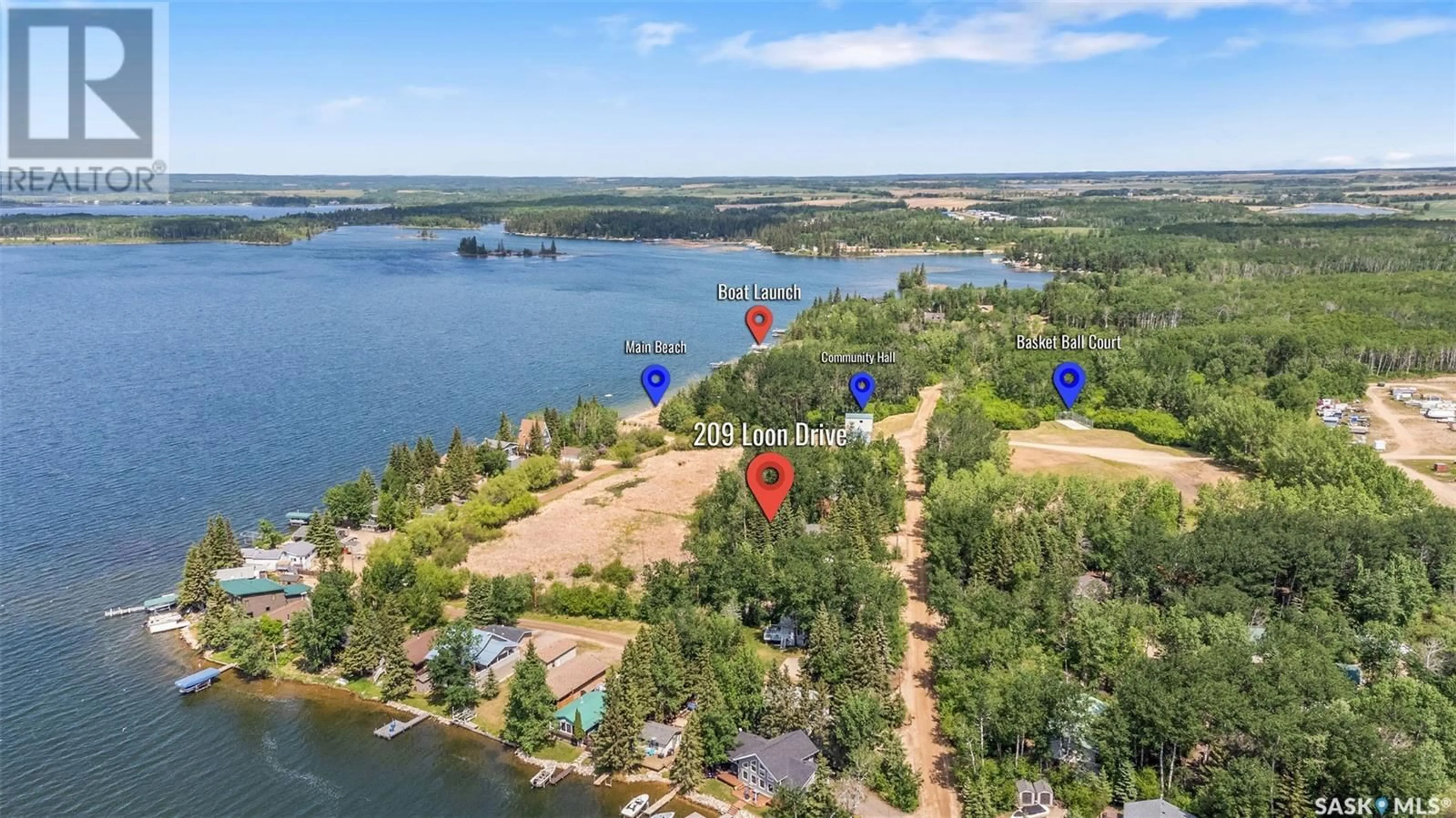 A pic from outside/outdoor area/front of a property/back of a property/a pic from drone, water/lake/river/ocean view for 209 LOON DRIVE, Big Shell Saskatchewan S0J2G0