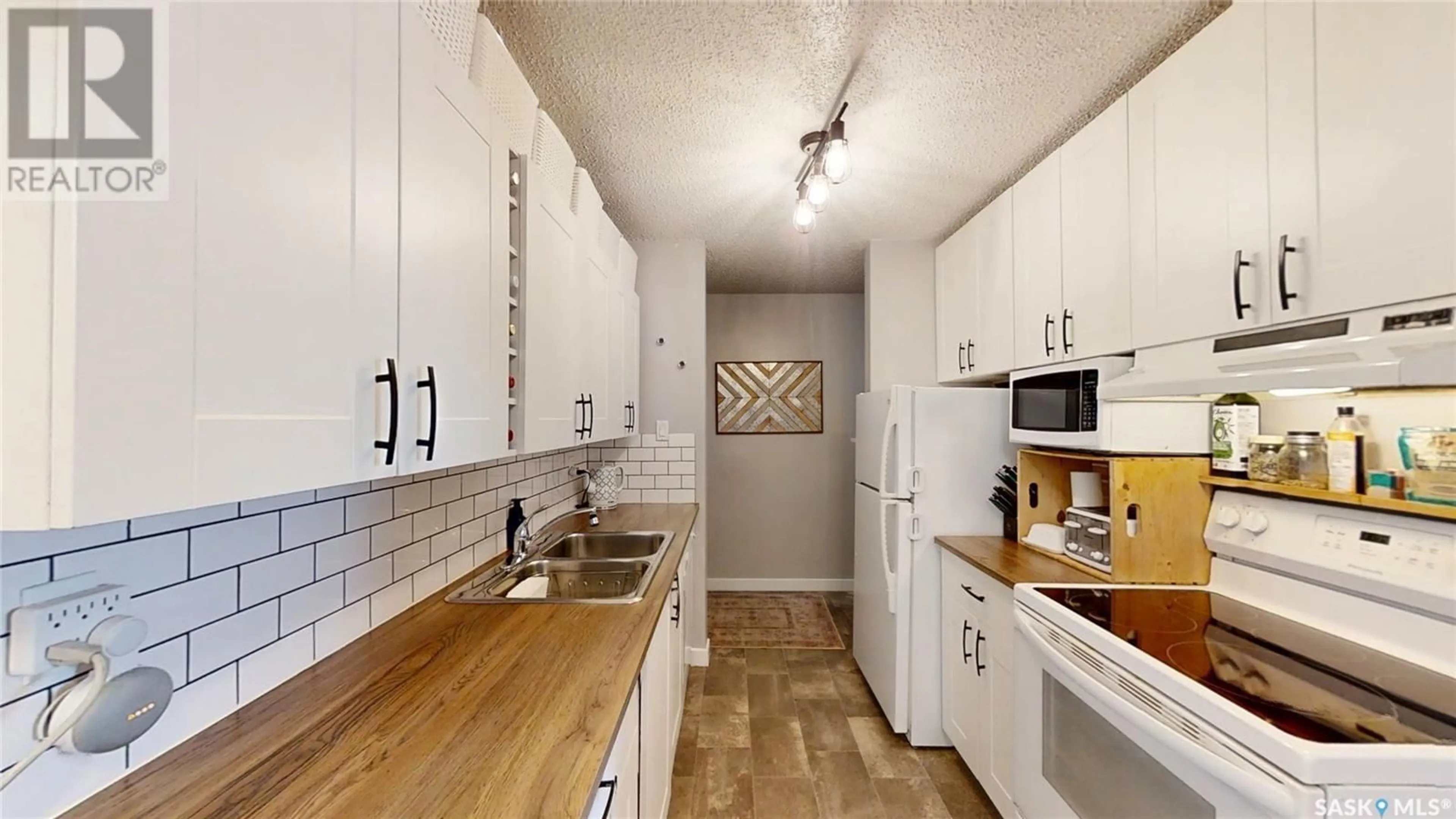 Standard kitchen, ceramic/tile floor for 119 3302 33RD STREET, Saskatoon Saskatchewan S7L6S5