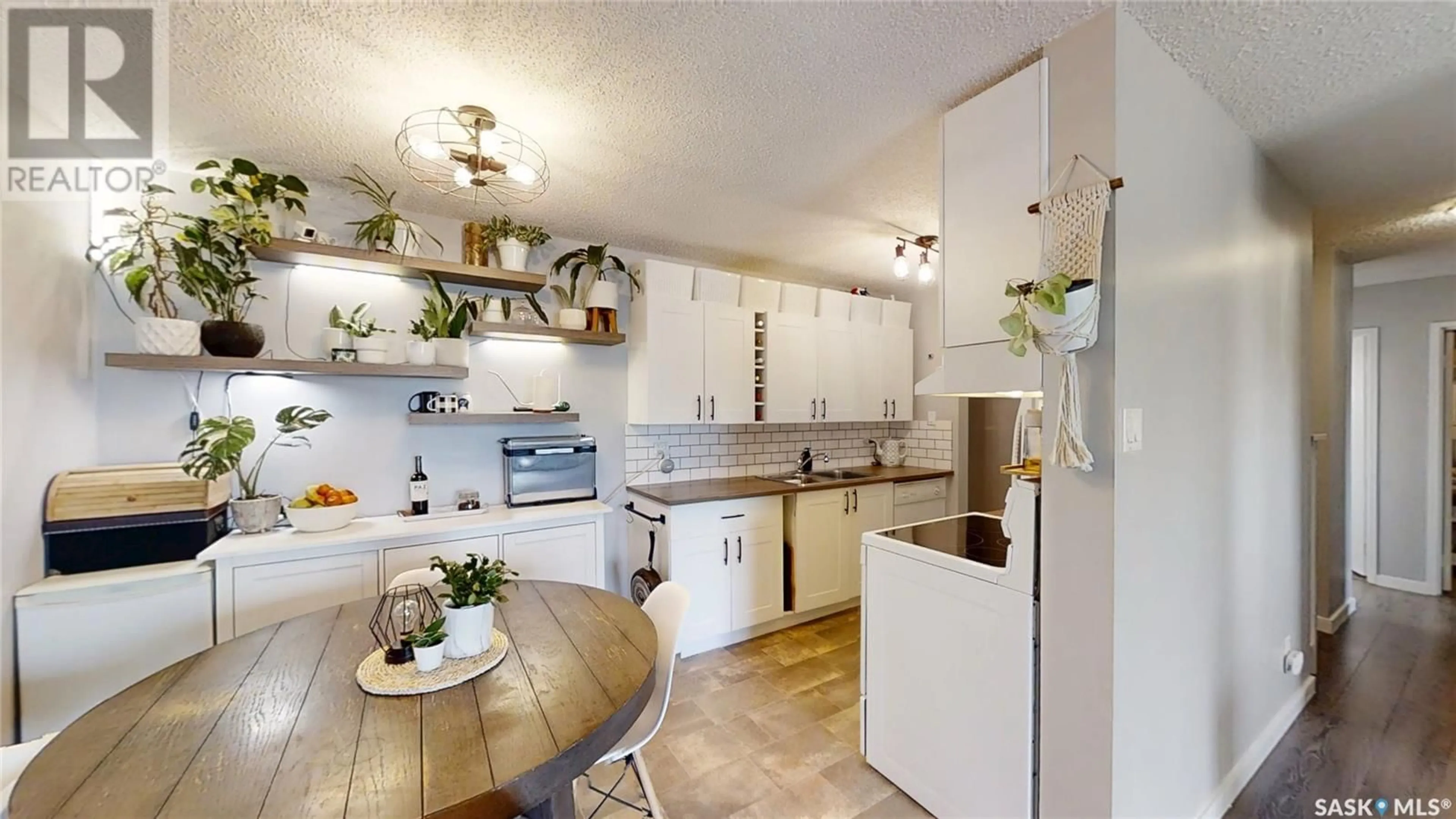 Open concept kitchen, unknown for 119 3302 33RD STREET, Saskatoon Saskatchewan S7L6S5