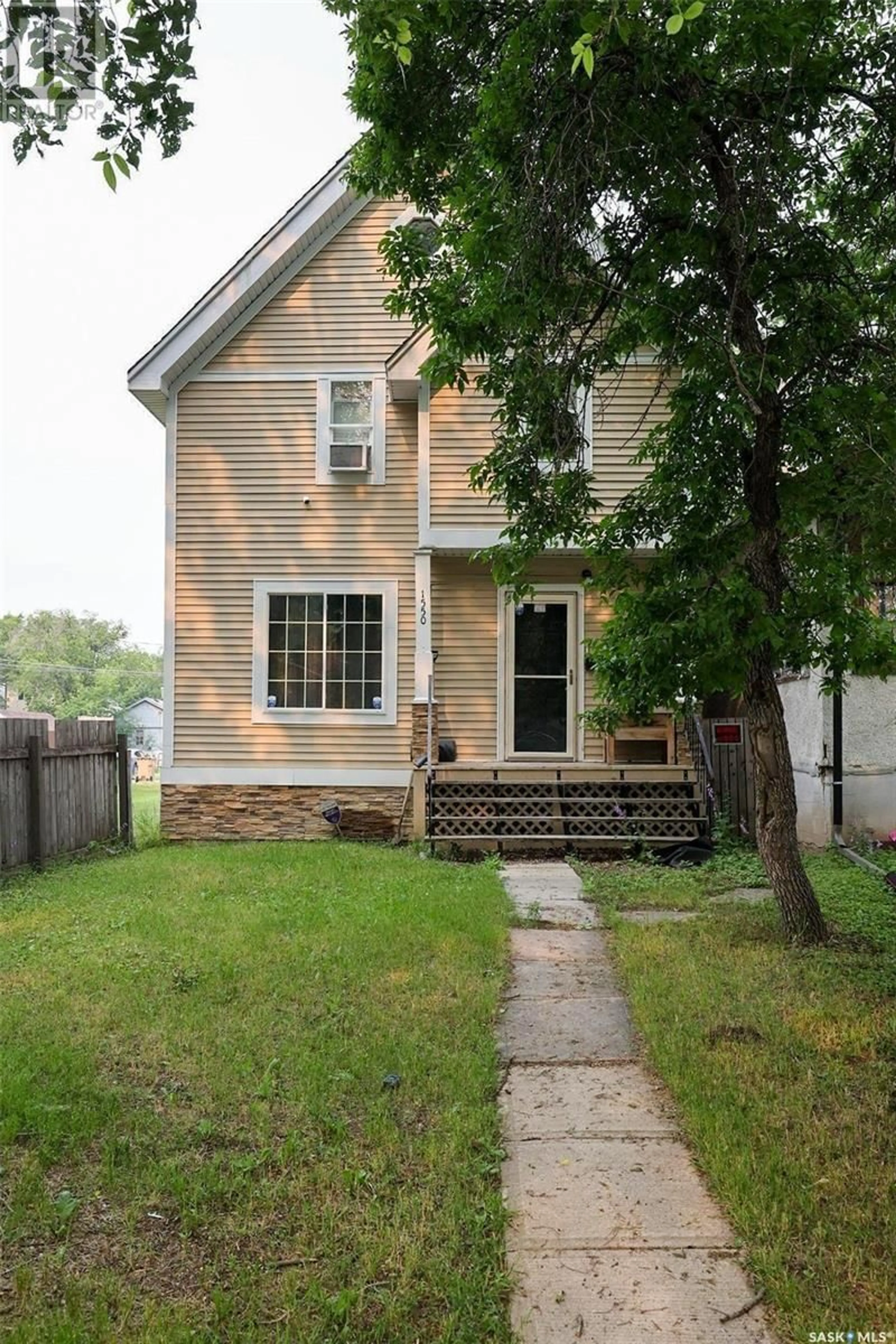 Home with vinyl exterior material, street for 1550 ROBINSON STREET, Regina Saskatchewan S4T2N8