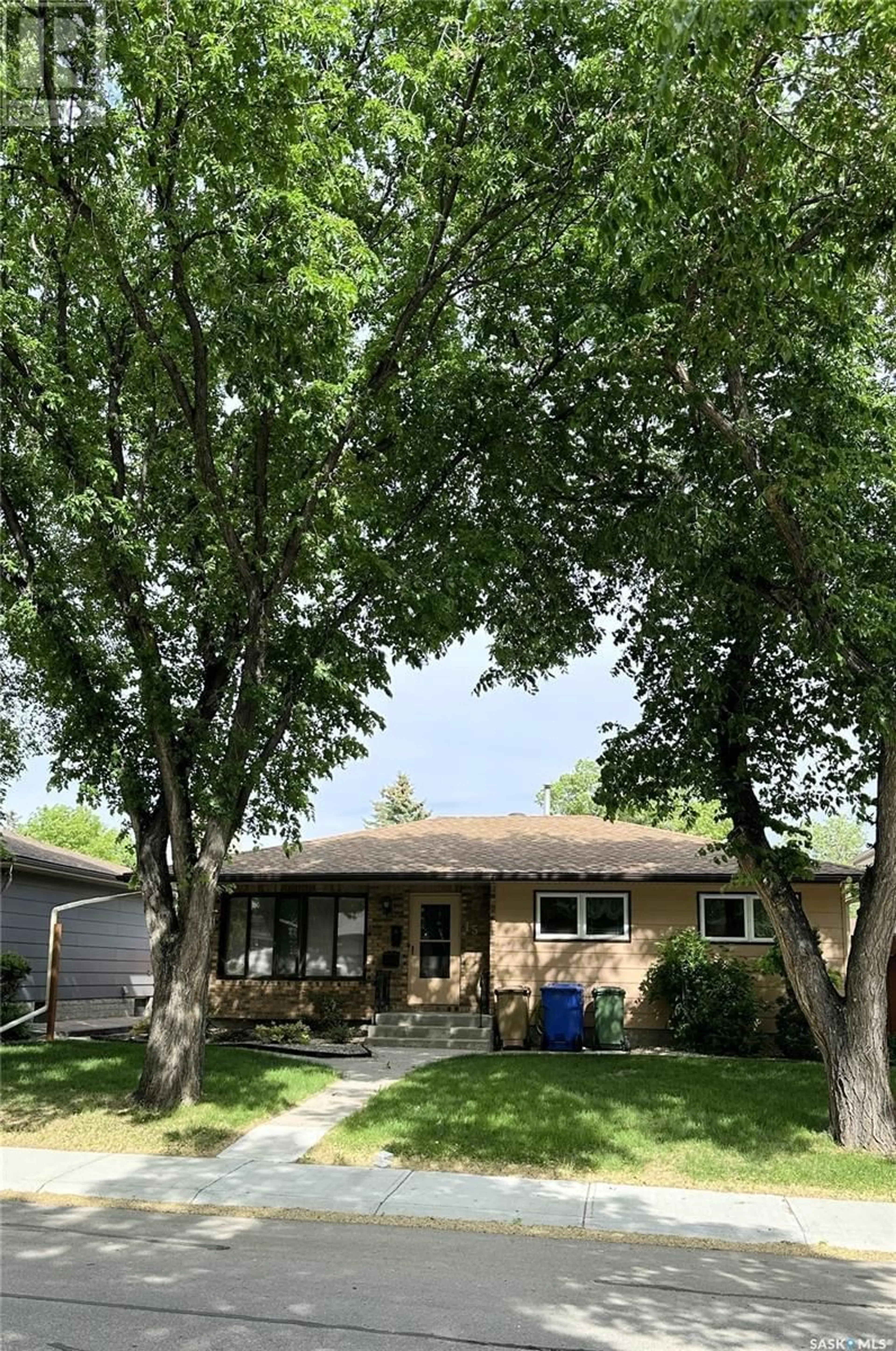 Home with vinyl exterior material, street for 15 EDENWOLD CRESCENT, Regina Saskatchewan S4R8A6