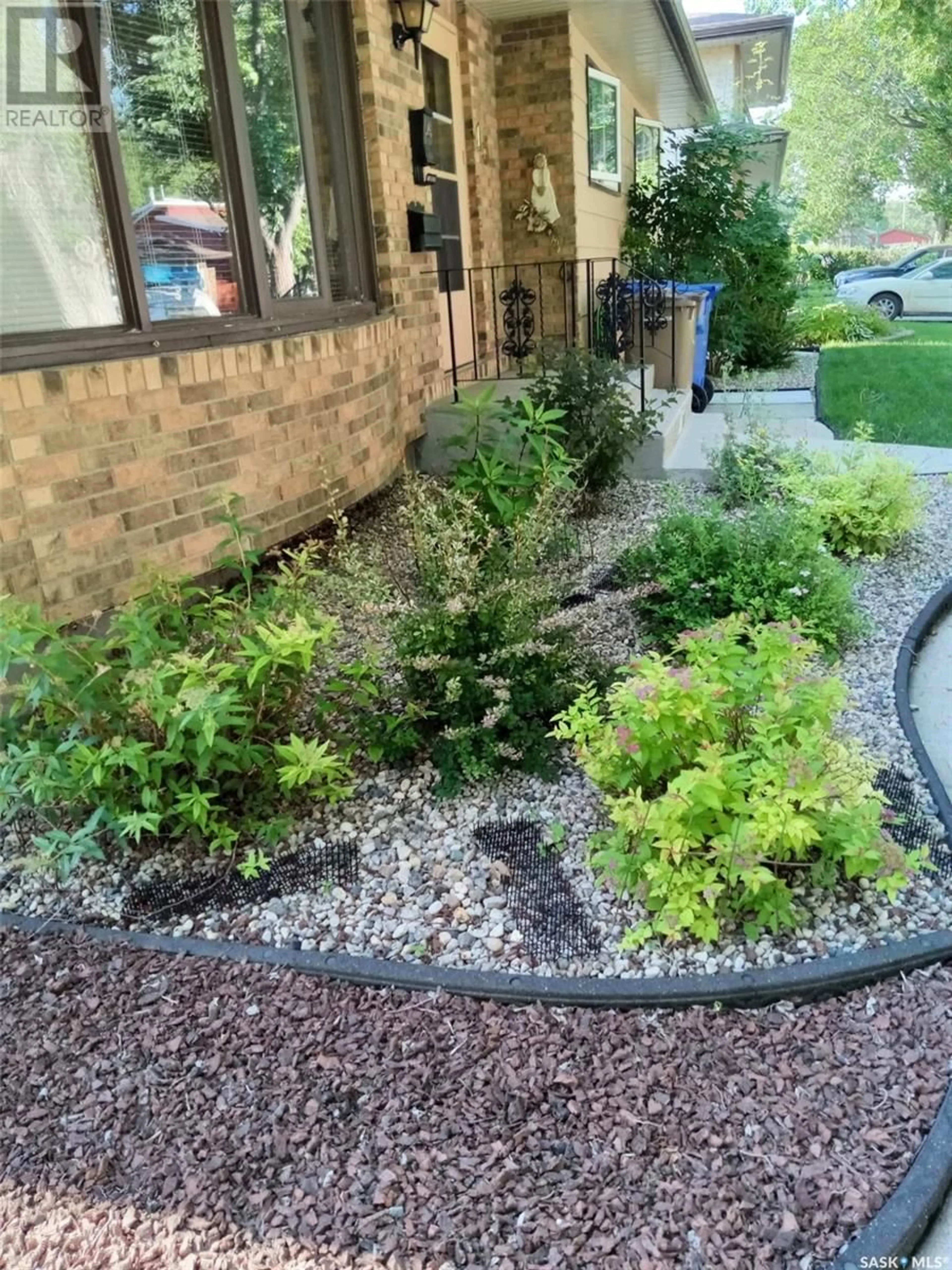 Patio, street for 15 EDENWOLD CRESCENT, Regina Saskatchewan S4R8A6