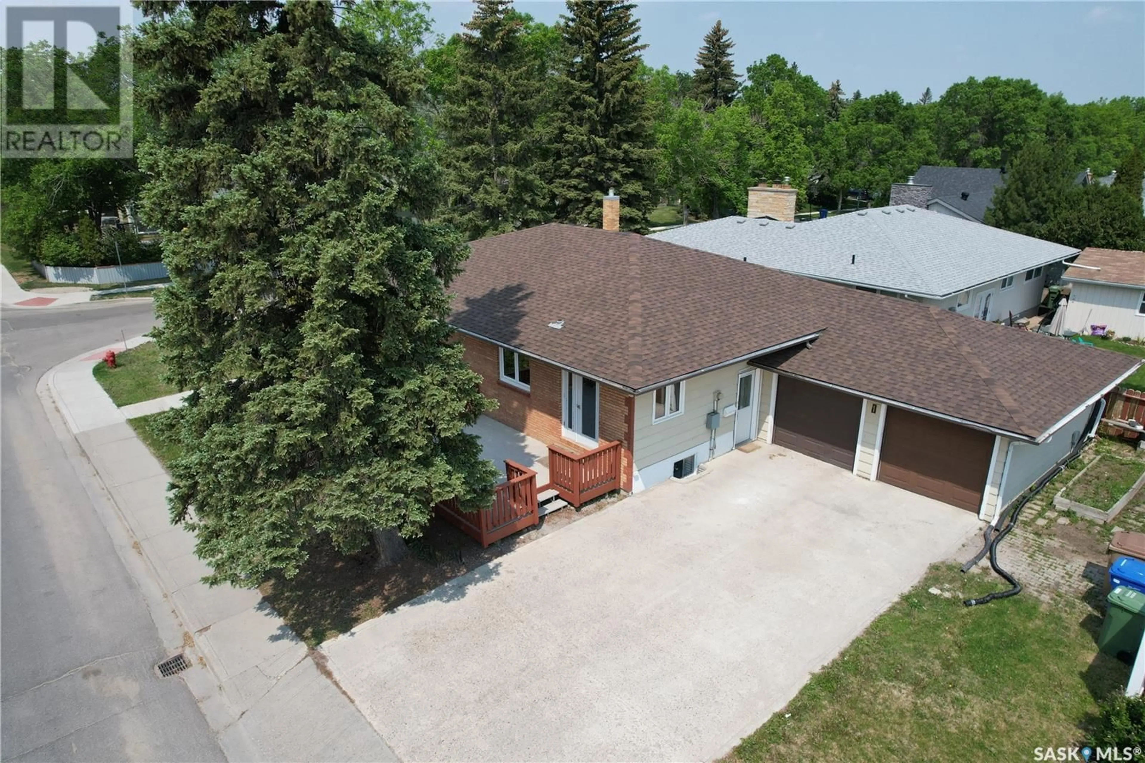 A pic from outside/outdoor area/front of a property/back of a property/a pic from drone, street for 1 CALDER CRESCENT, Regina Saskatchewan S4S4A5