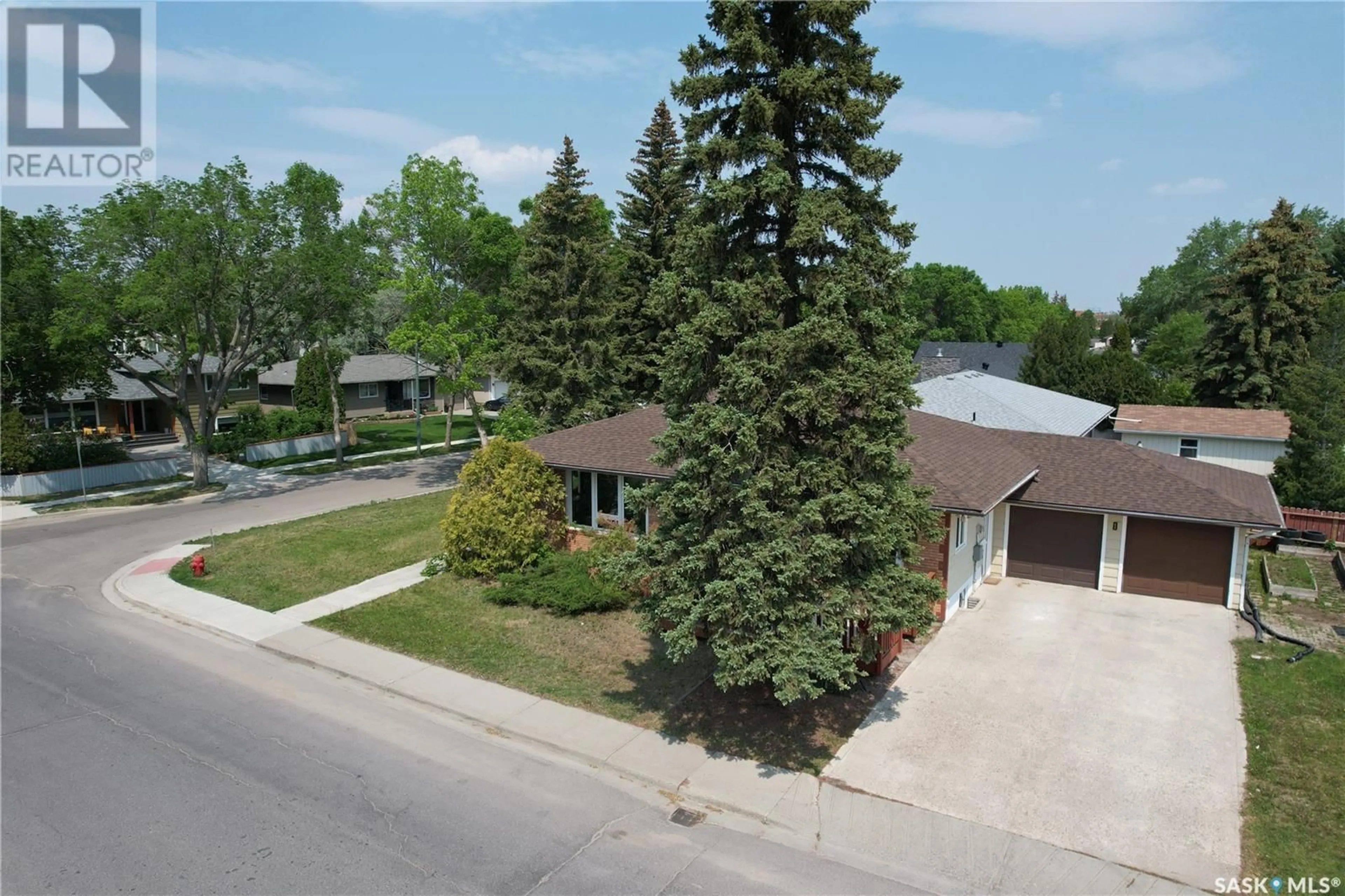 A pic from outside/outdoor area/front of a property/back of a property/a pic from drone, street for 1 CALDER CRESCENT, Regina Saskatchewan S4S4A5