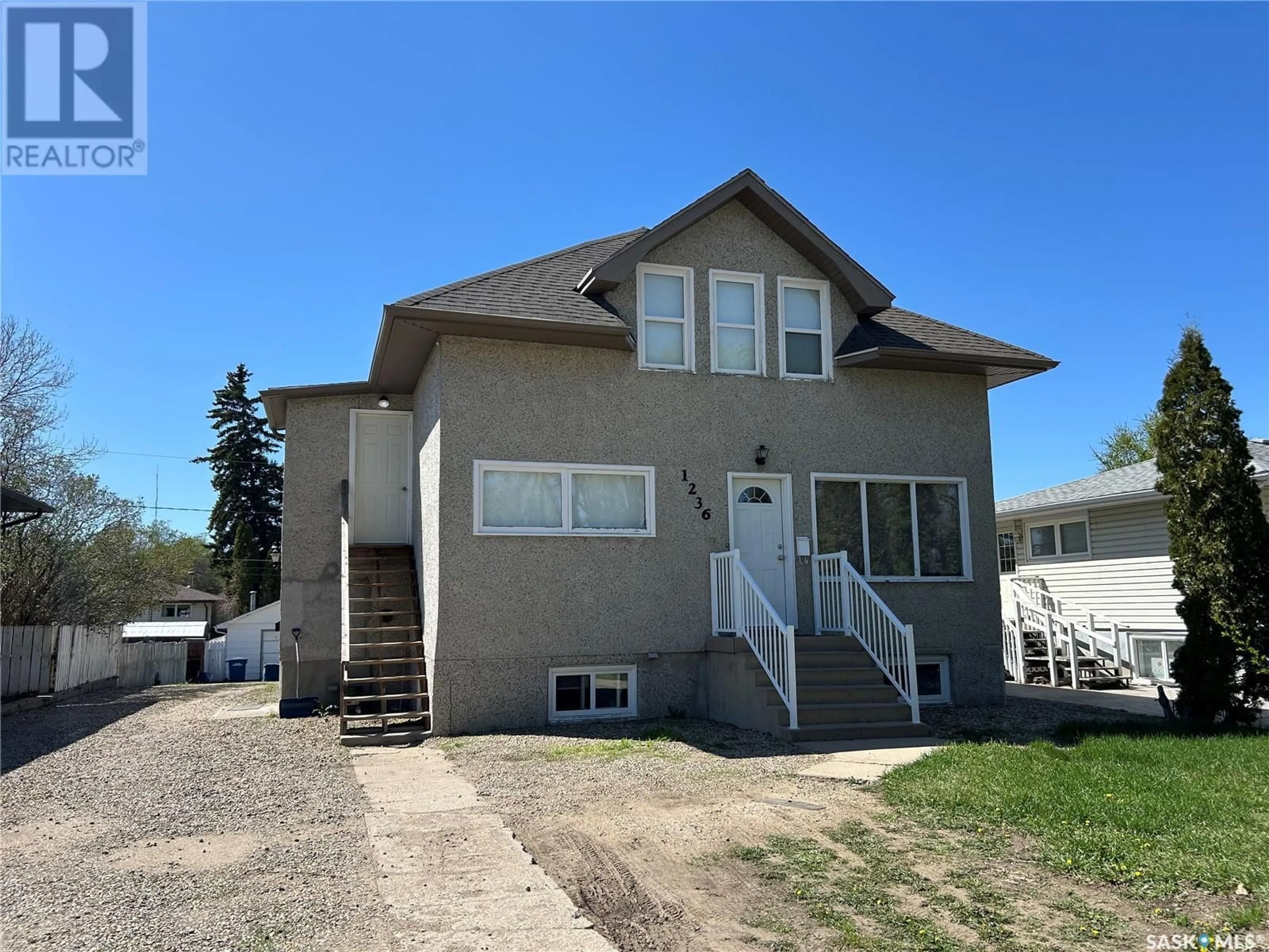 Home with vinyl exterior material, street for 1236 HENLEAZE AVENUE, Moose Jaw Saskatchewan S6H3V9