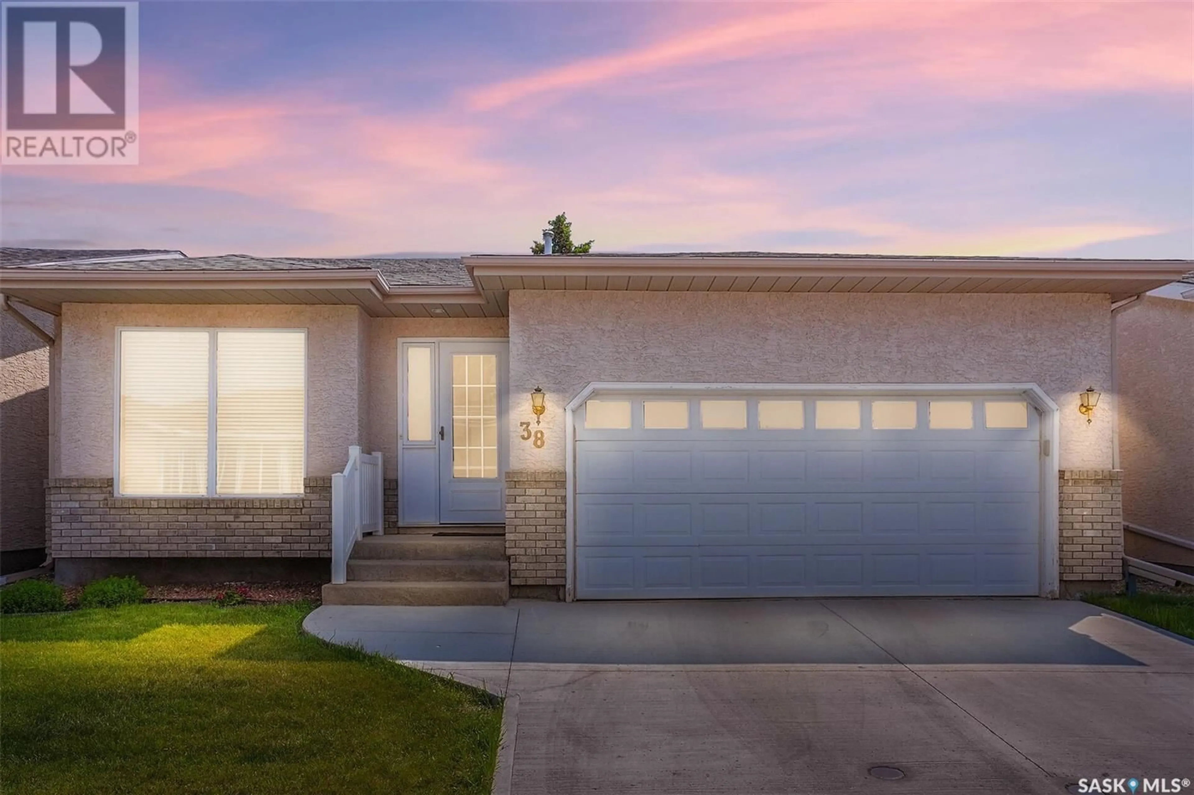 Home with vinyl exterior material, street for 38 GREENSBORO DRIVE, Regina Saskatchewan S4S7G1