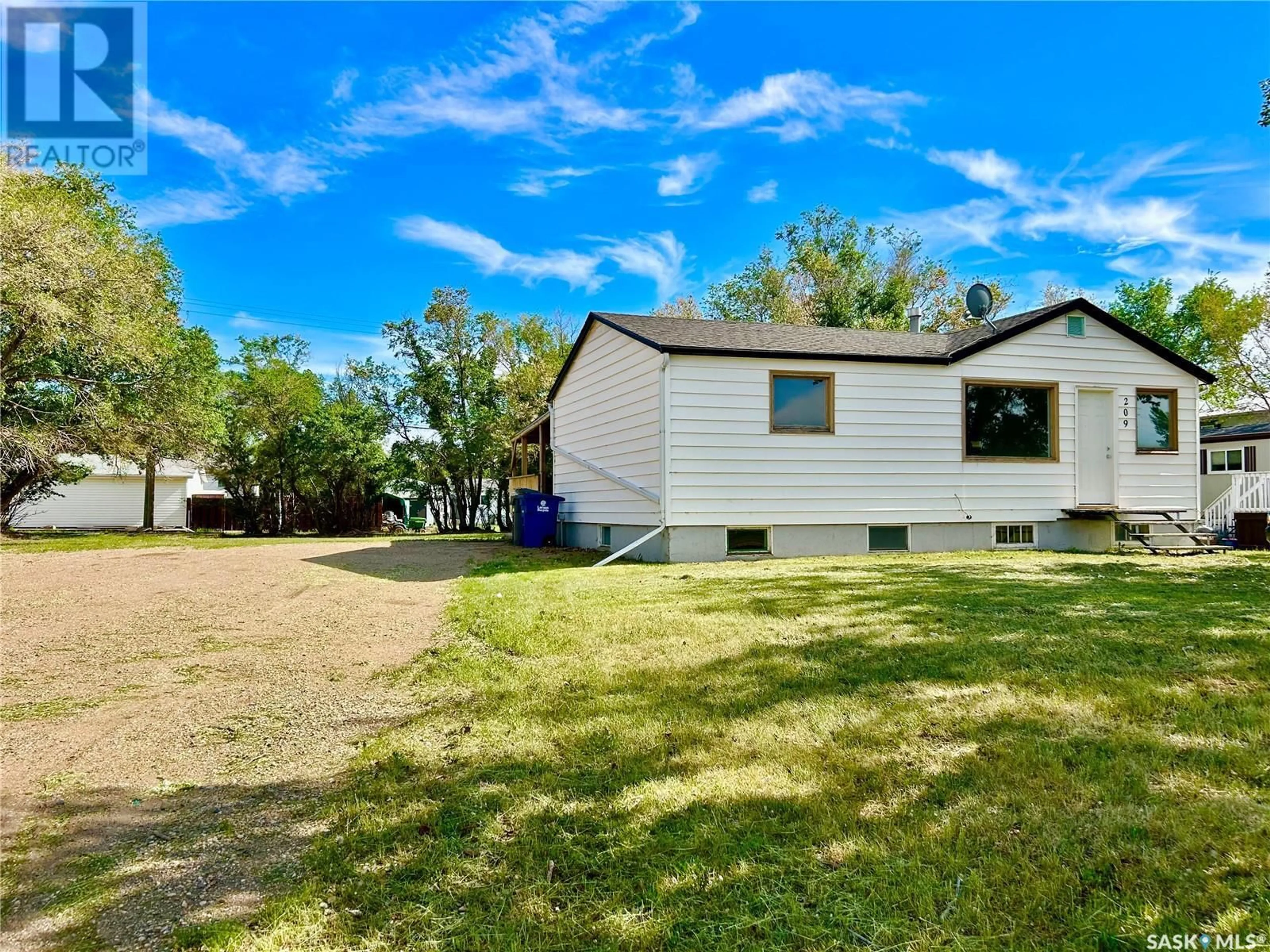 A pic from outside/outdoor area/front of a property/back of a property/a pic from drone, unknown for 209 4TH AVENUE, Coleville Saskatchewan S0L0K0