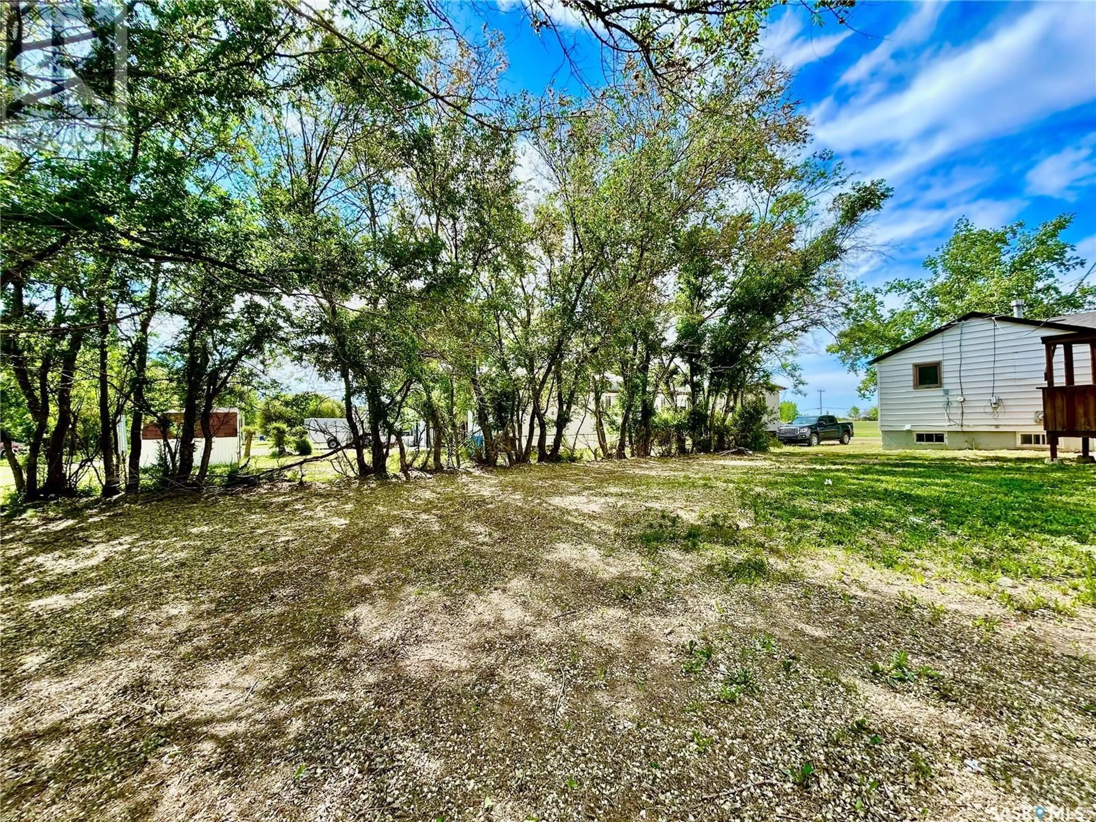 A pic from outside/outdoor area/front of a property/back of a property/a pic from drone, water/lake/river/ocean view for 209 4TH AVENUE, Coleville Saskatchewan S0L0K0