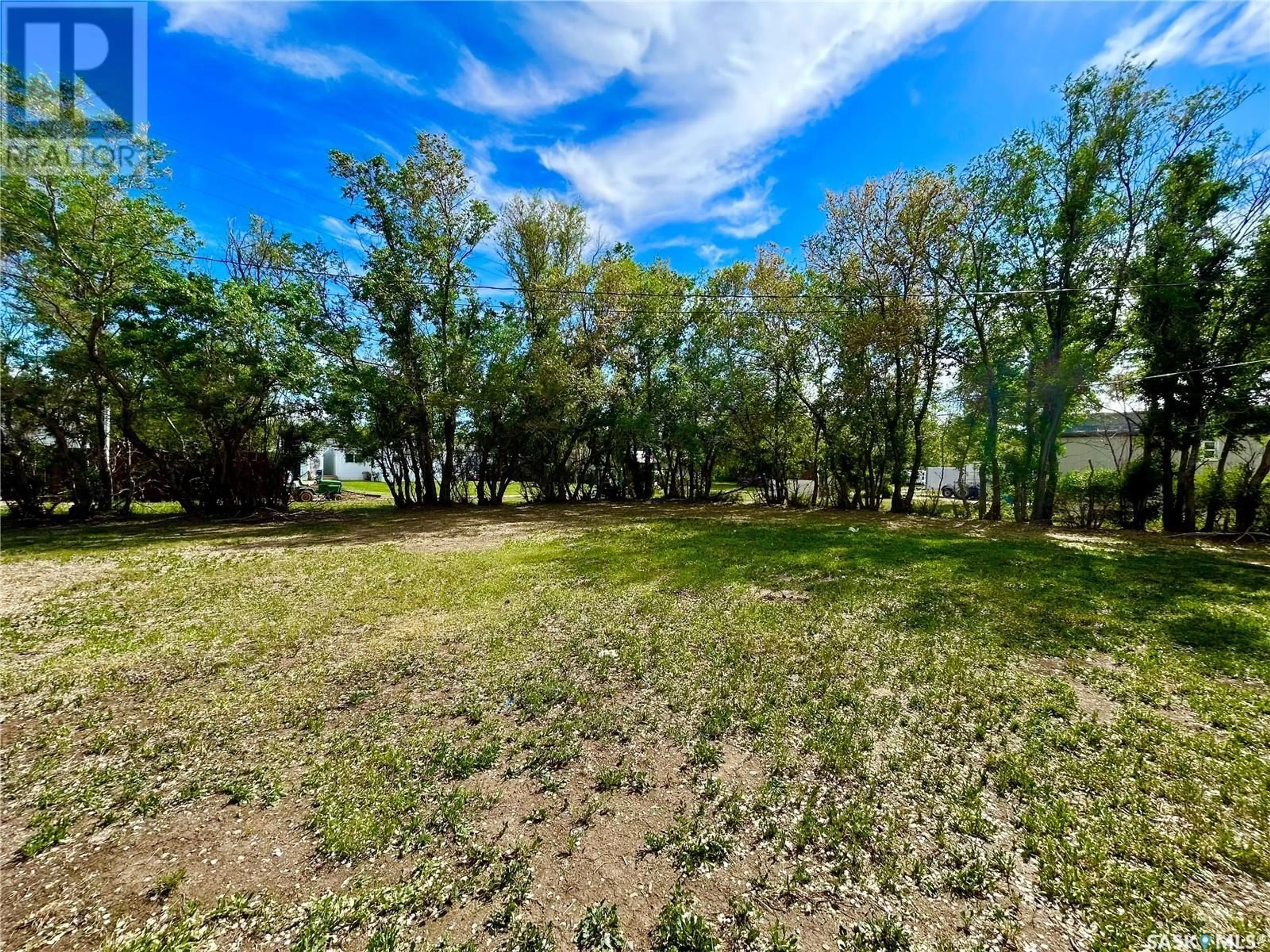 A pic from outside/outdoor area/front of a property/back of a property/a pic from drone, water/lake/river/ocean view for 209 4TH AVENUE, Coleville Saskatchewan S0L0K0