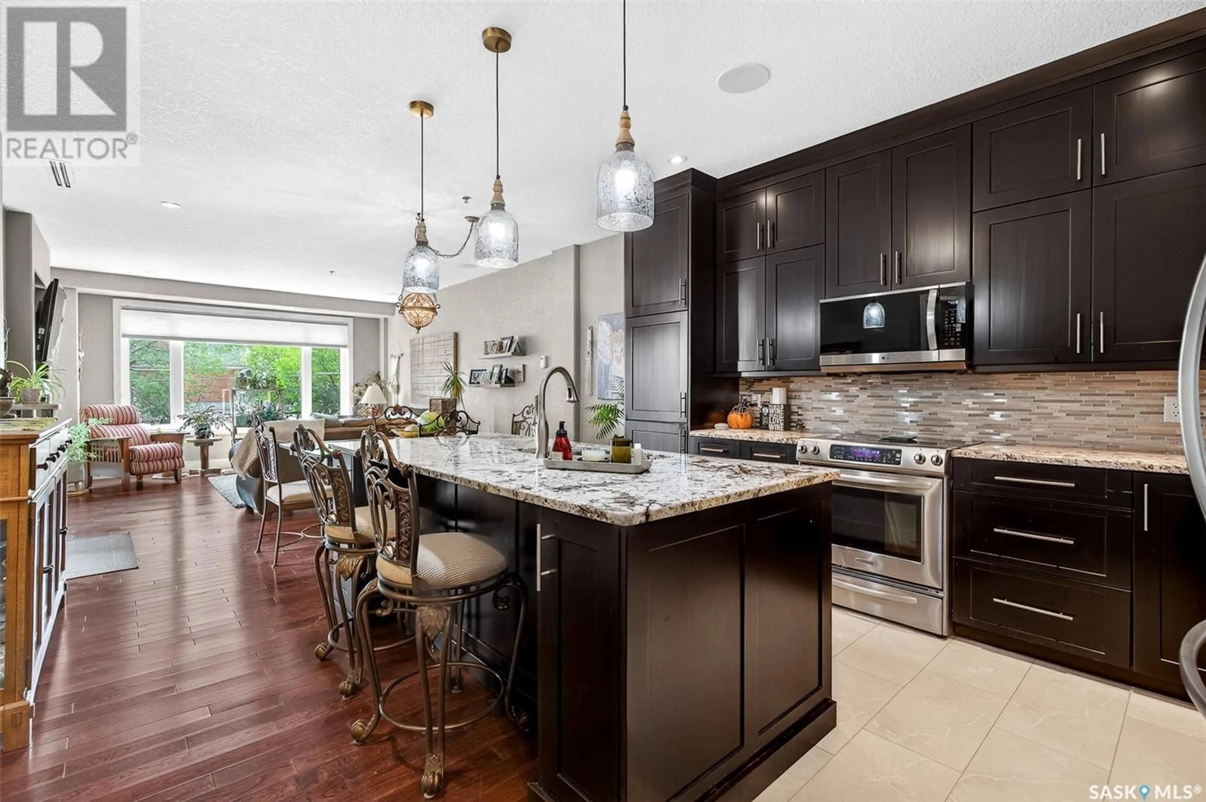Open concept kitchen, ceramic/tile floor for 205 - 206 FAIRFORD STREET, Moose Jaw Saskatchewan S6H0E1