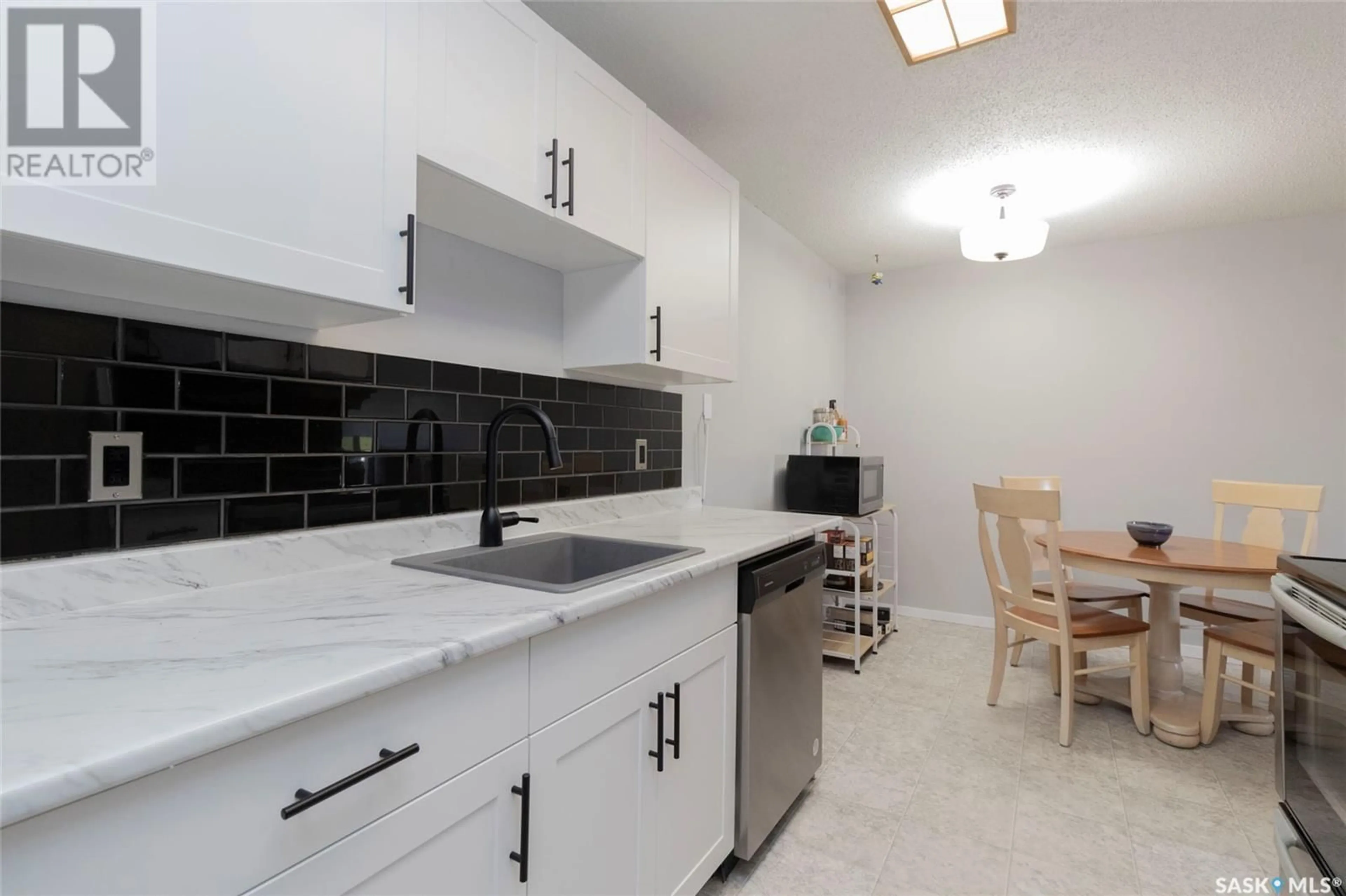Standard kitchen, ceramic/tile floor for 310 - 625 STILLWATER DRIVE, Saskatoon Saskatchewan S7J4H7
