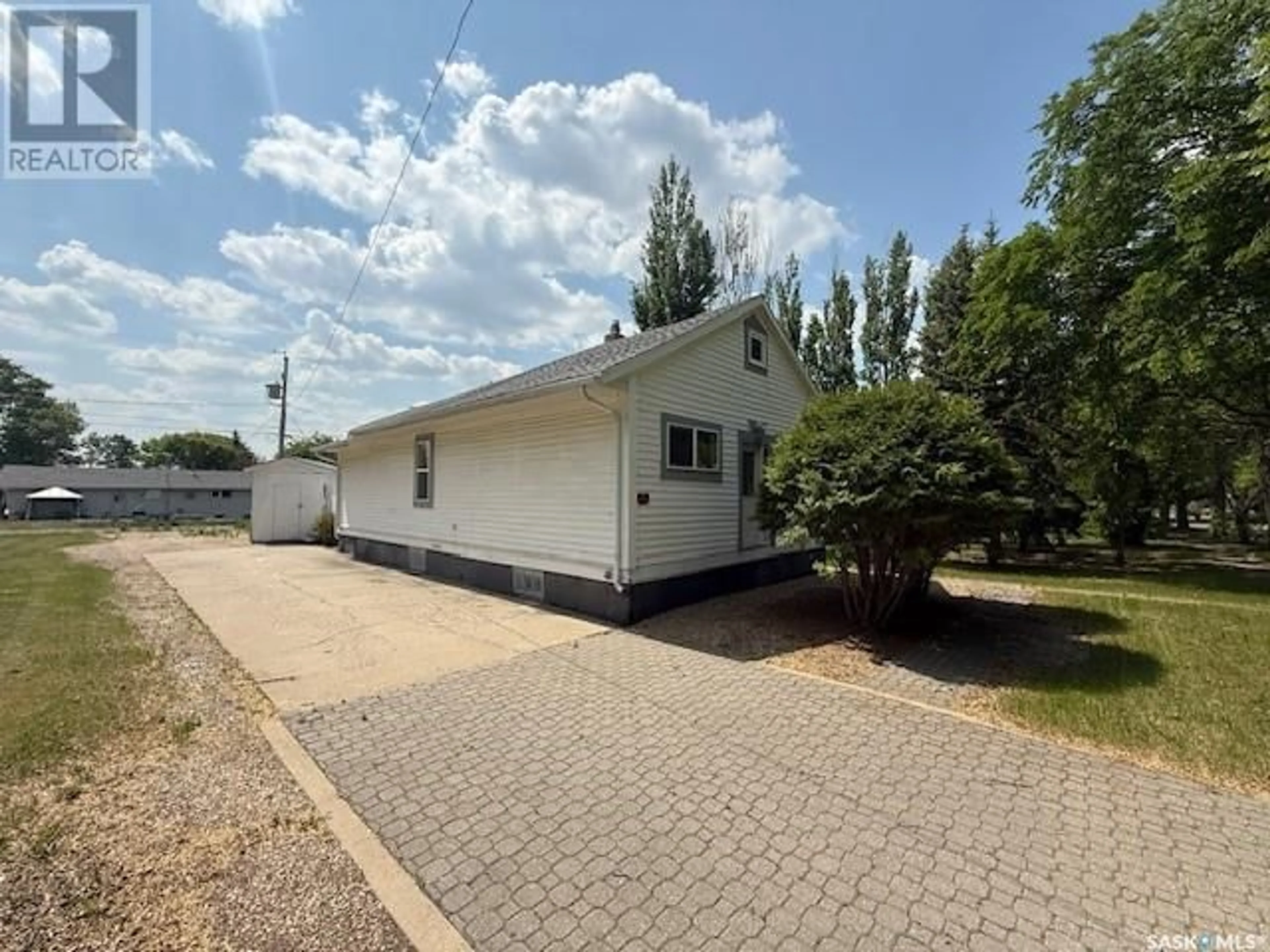 Home with vinyl exterior material, street for 222 MAXWELL STREET, Kamsack Saskatchewan S0A1S0