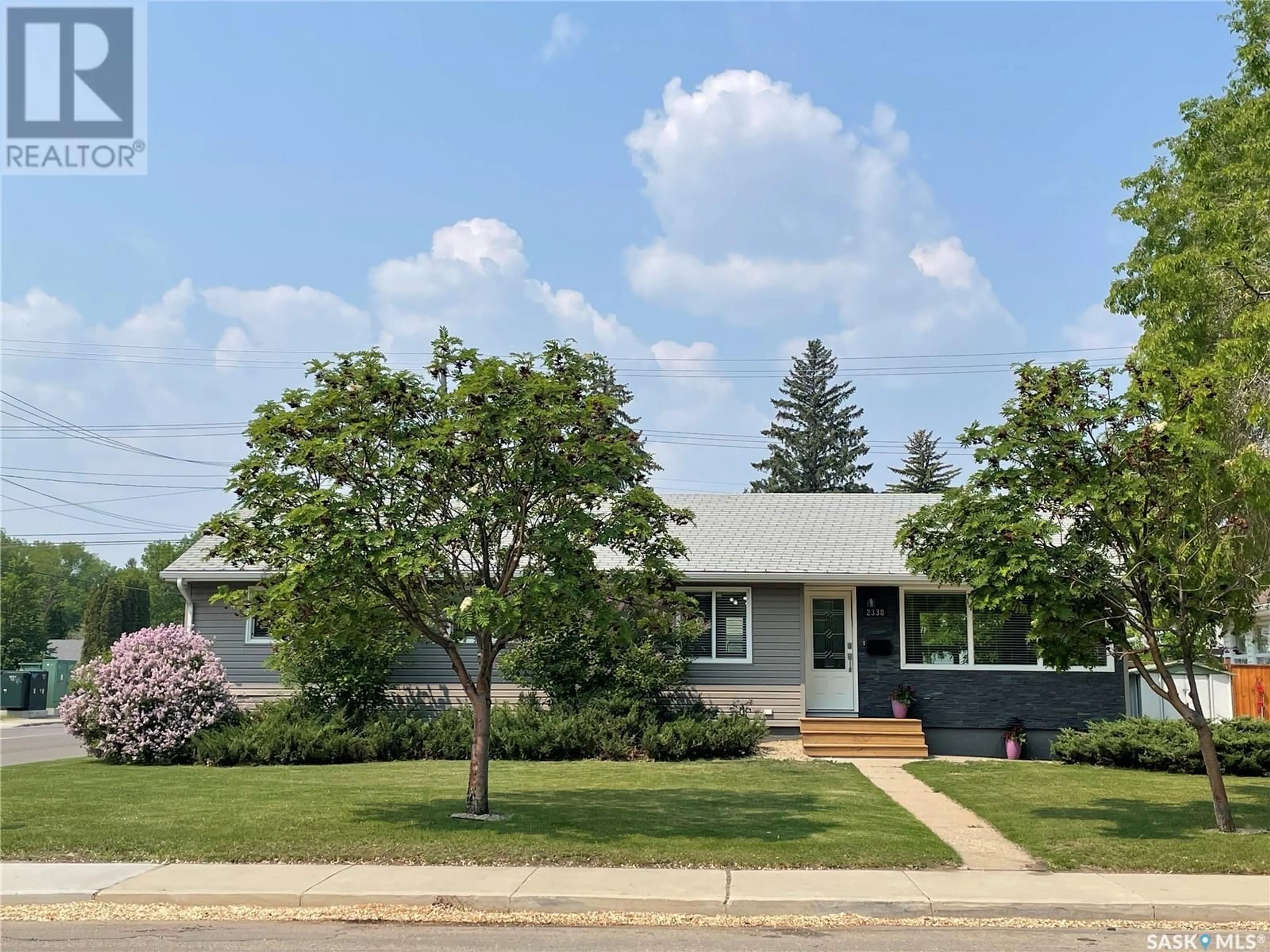Home with vinyl exterior material, street for 2338 WILLIAM AVENUE, Saskatoon Saskatchewan S7J1A8