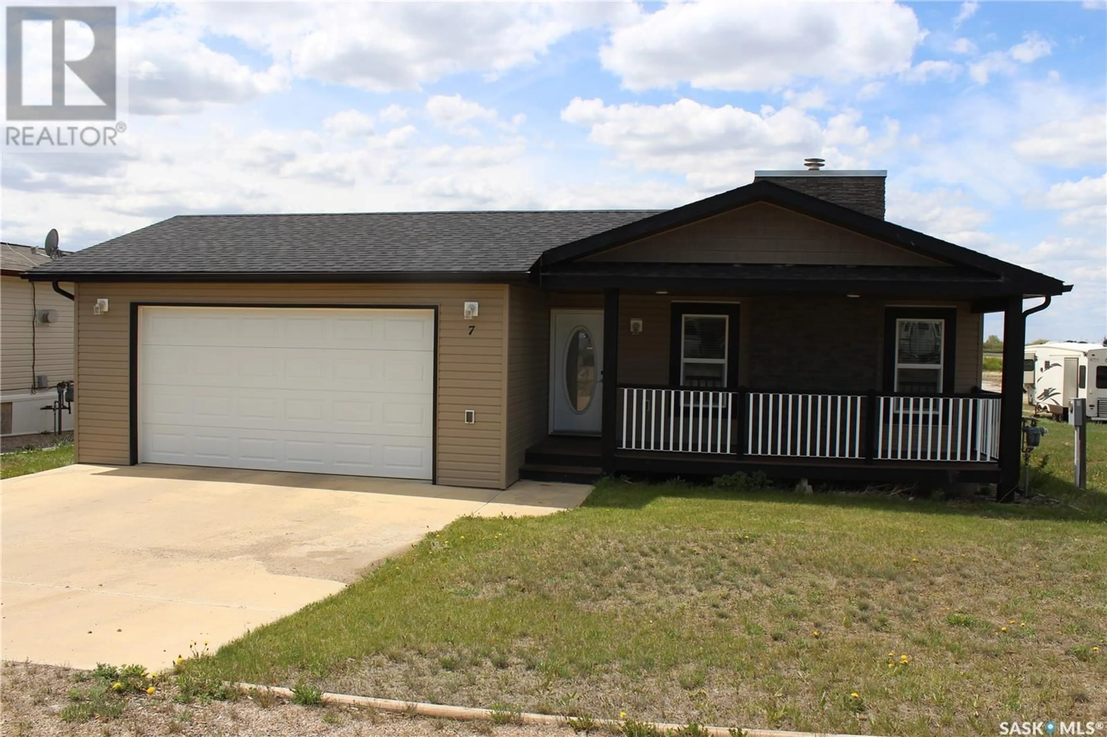 Home with vinyl exterior material, street for 2004 - 7 ALICE ROAD, Estevan Saskatchewan S4A1G7