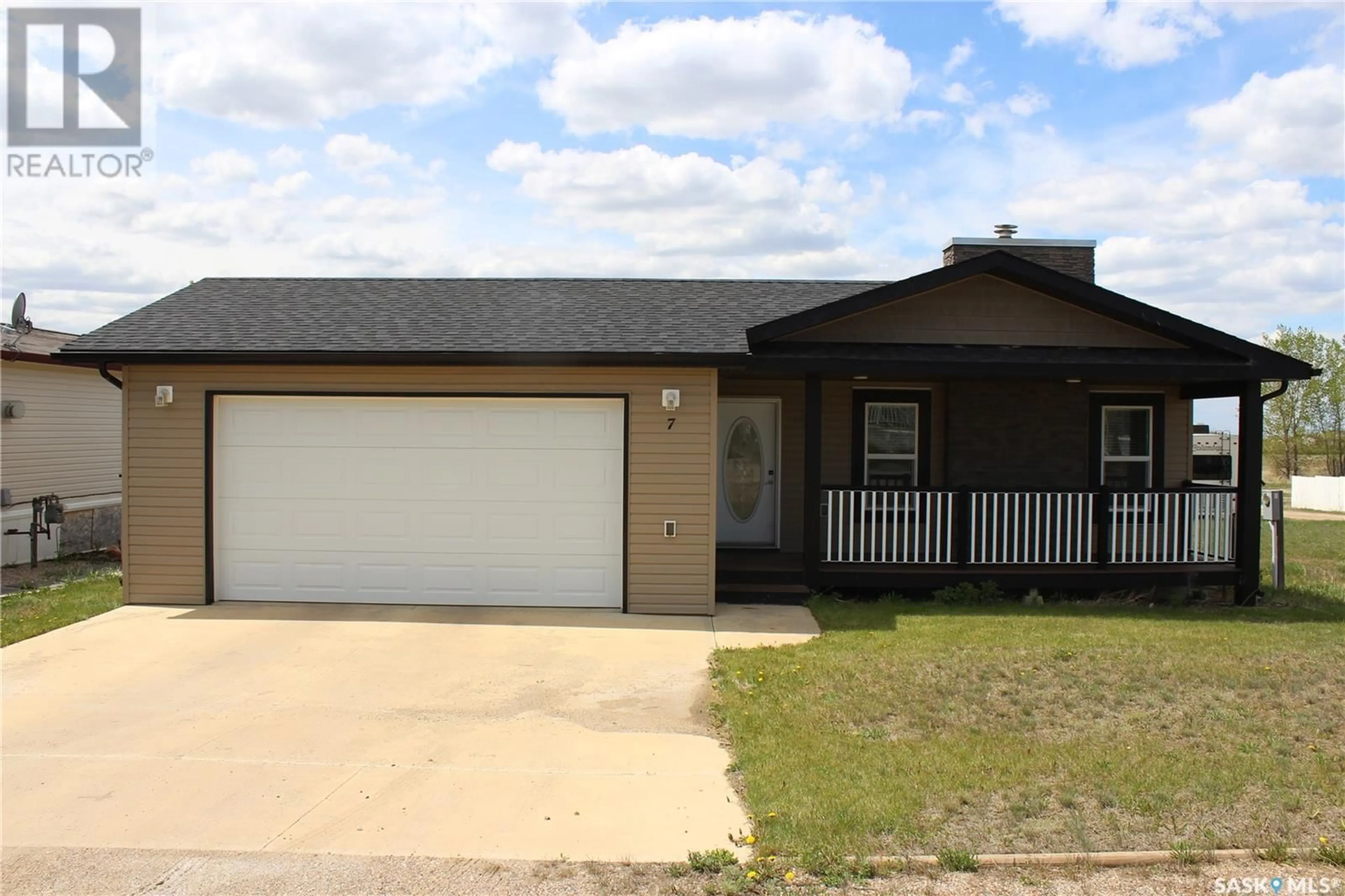Home with vinyl exterior material, street for 2004 - 7 ALICE ROAD, Estevan Saskatchewan S4A1G7