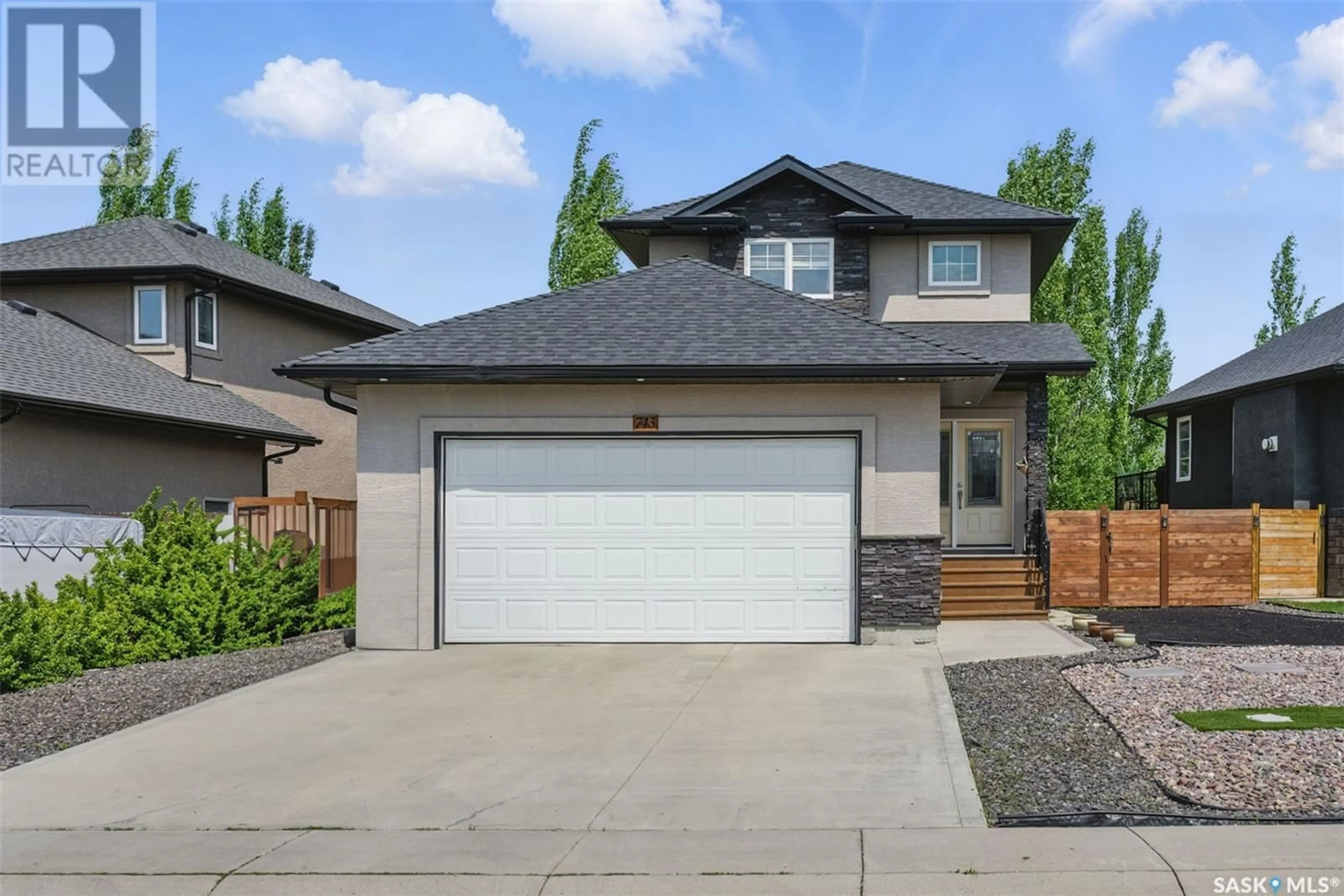 Home with vinyl exterior material, street for 743 SUTTER CRESCENT, Saskatoon Saskatchewan S7T0R5