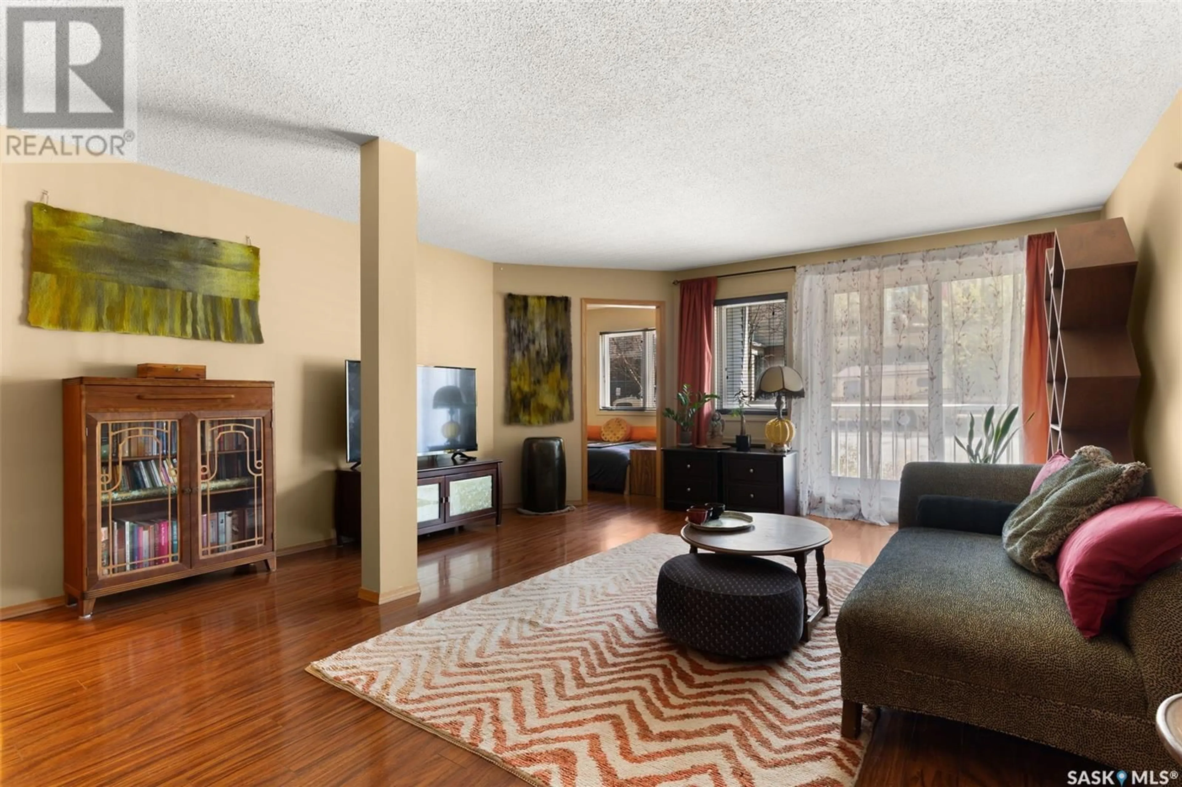 Living room with furniture, unknown for 107 - 2275 MCINTYRE STREET, Regina Saskatchewan S4P2S1
