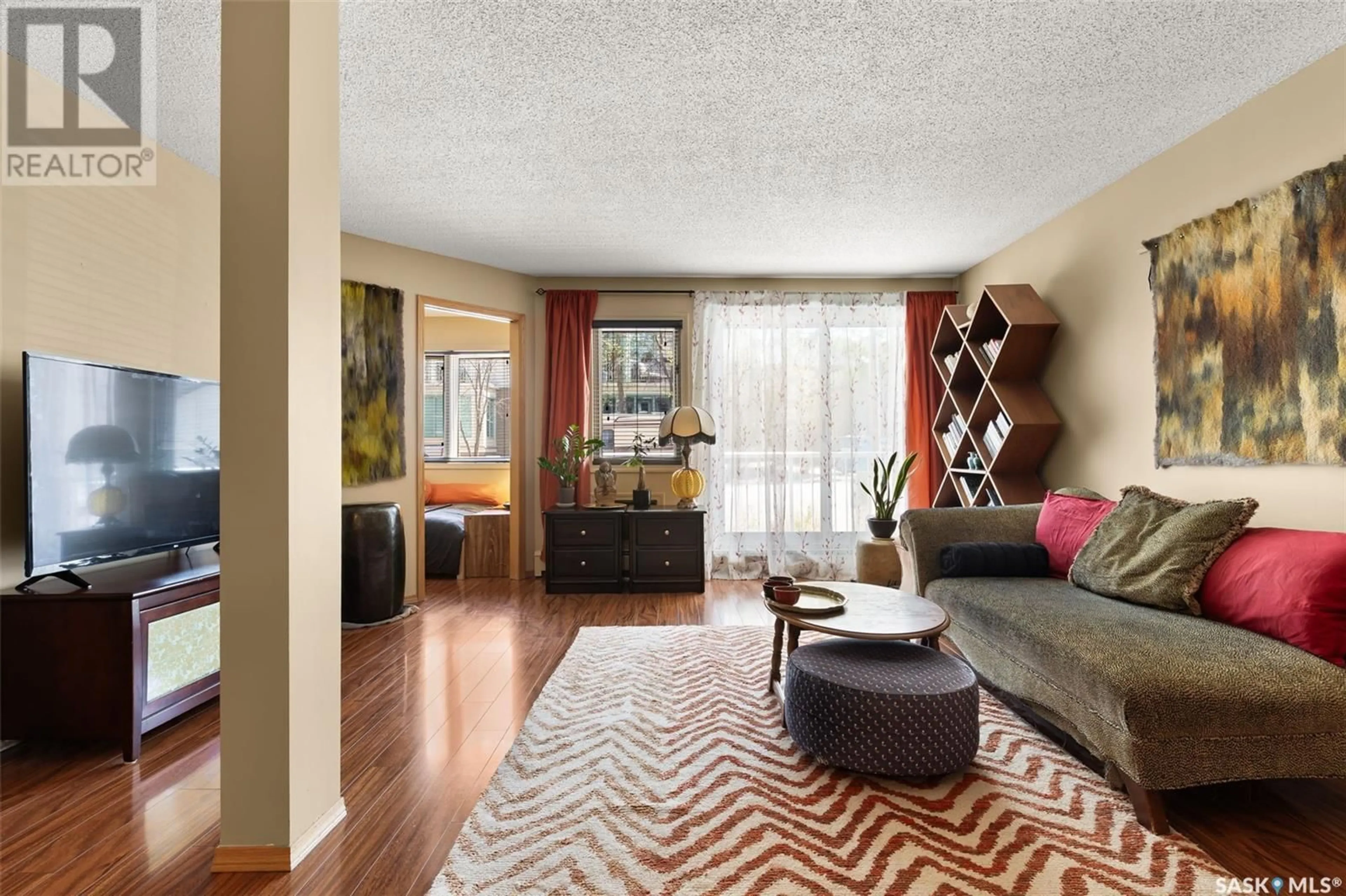 Living room with furniture, unknown for 107 - 2275 MCINTYRE STREET, Regina Saskatchewan S4P2S1