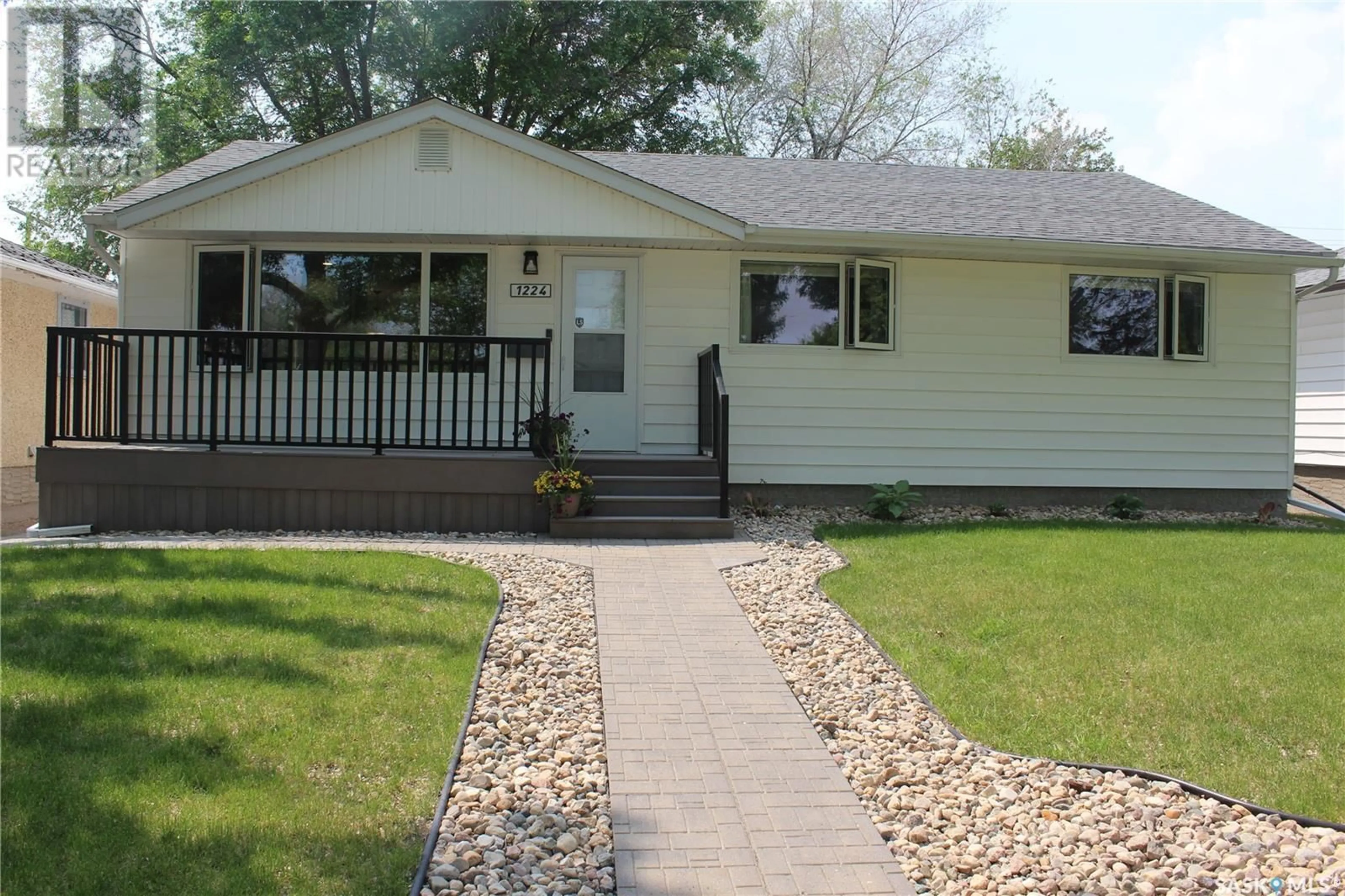 Home with vinyl exterior material, street for 1224 MINTO STREET, Regina Saskatchewan S4T5H9