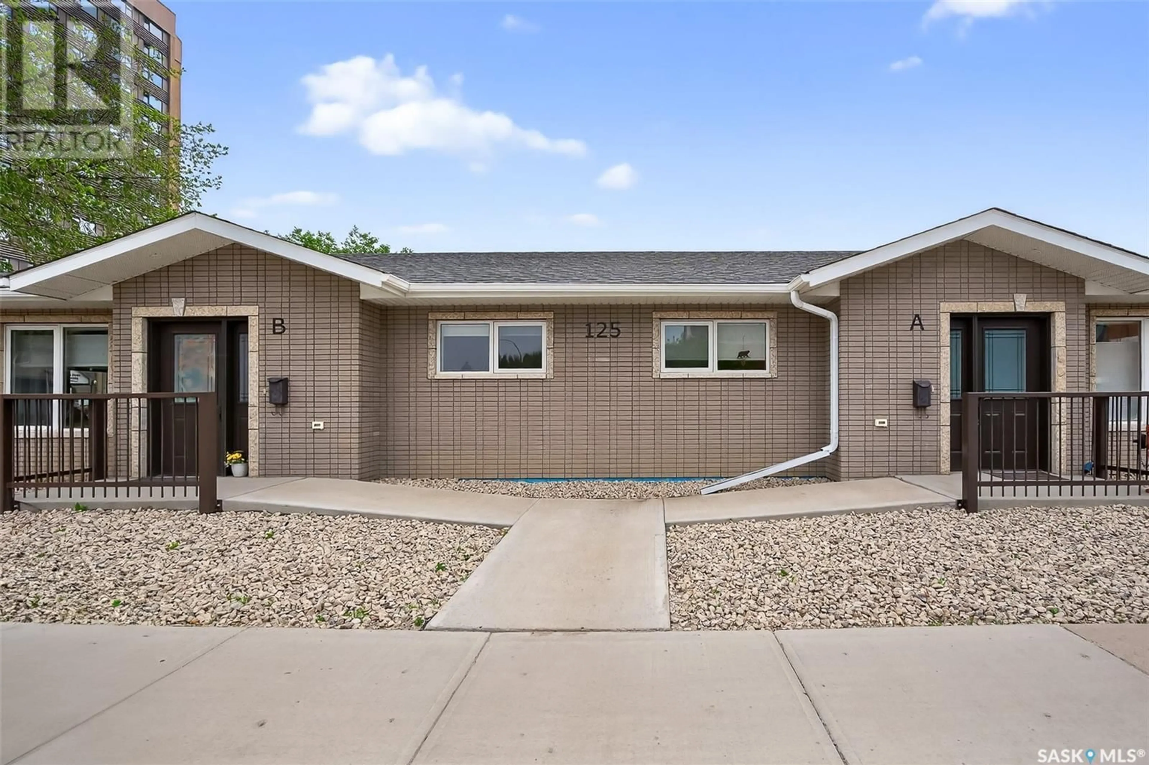 Home with vinyl exterior material, street for A&B - 125 2ND AVENUE, Moose Jaw Saskatchewan S6H2A2