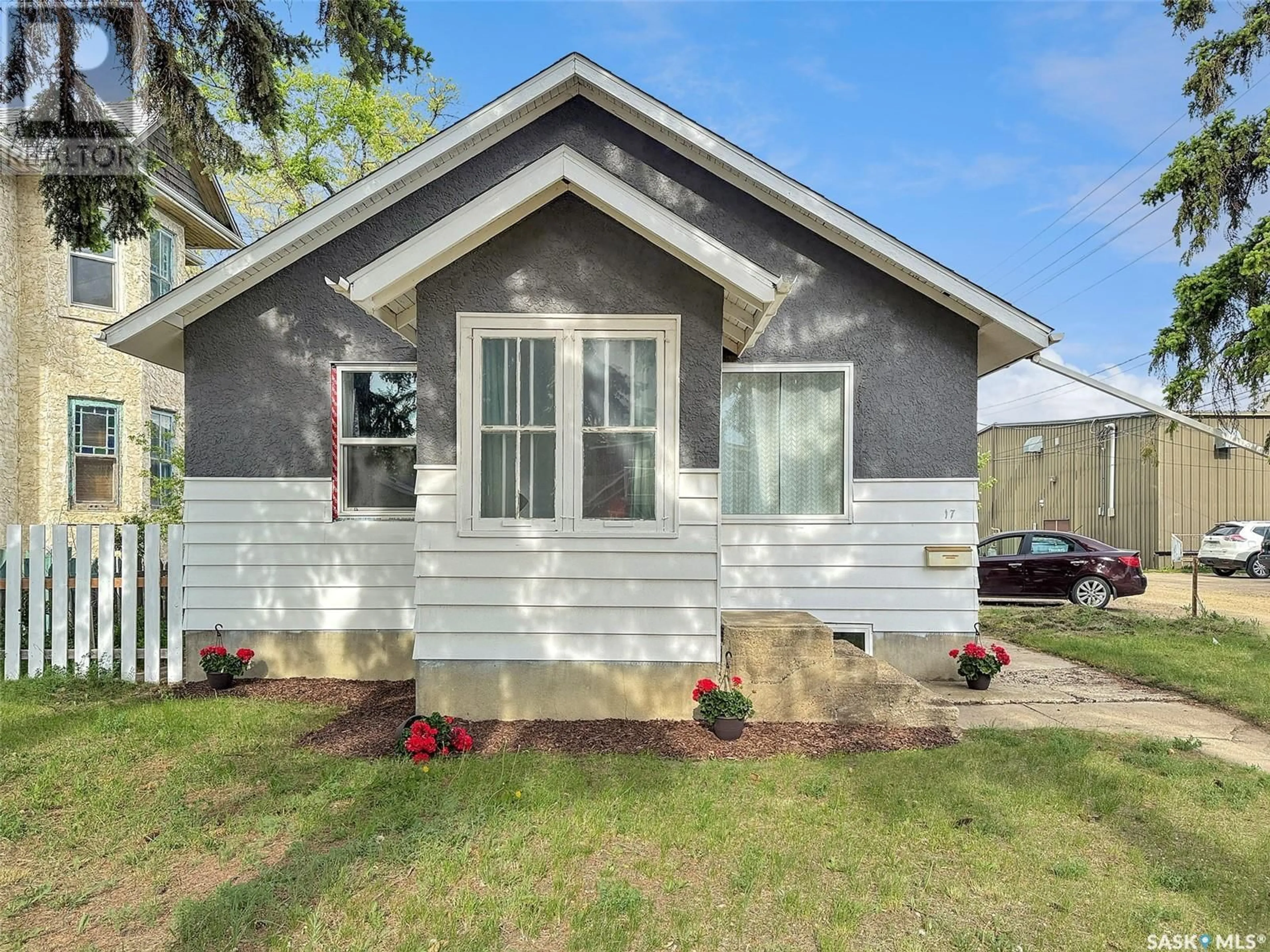 Home with vinyl exterior material, street for NE - 17 3RD AVENUE, Swift Current Saskatchewan S9H2G3