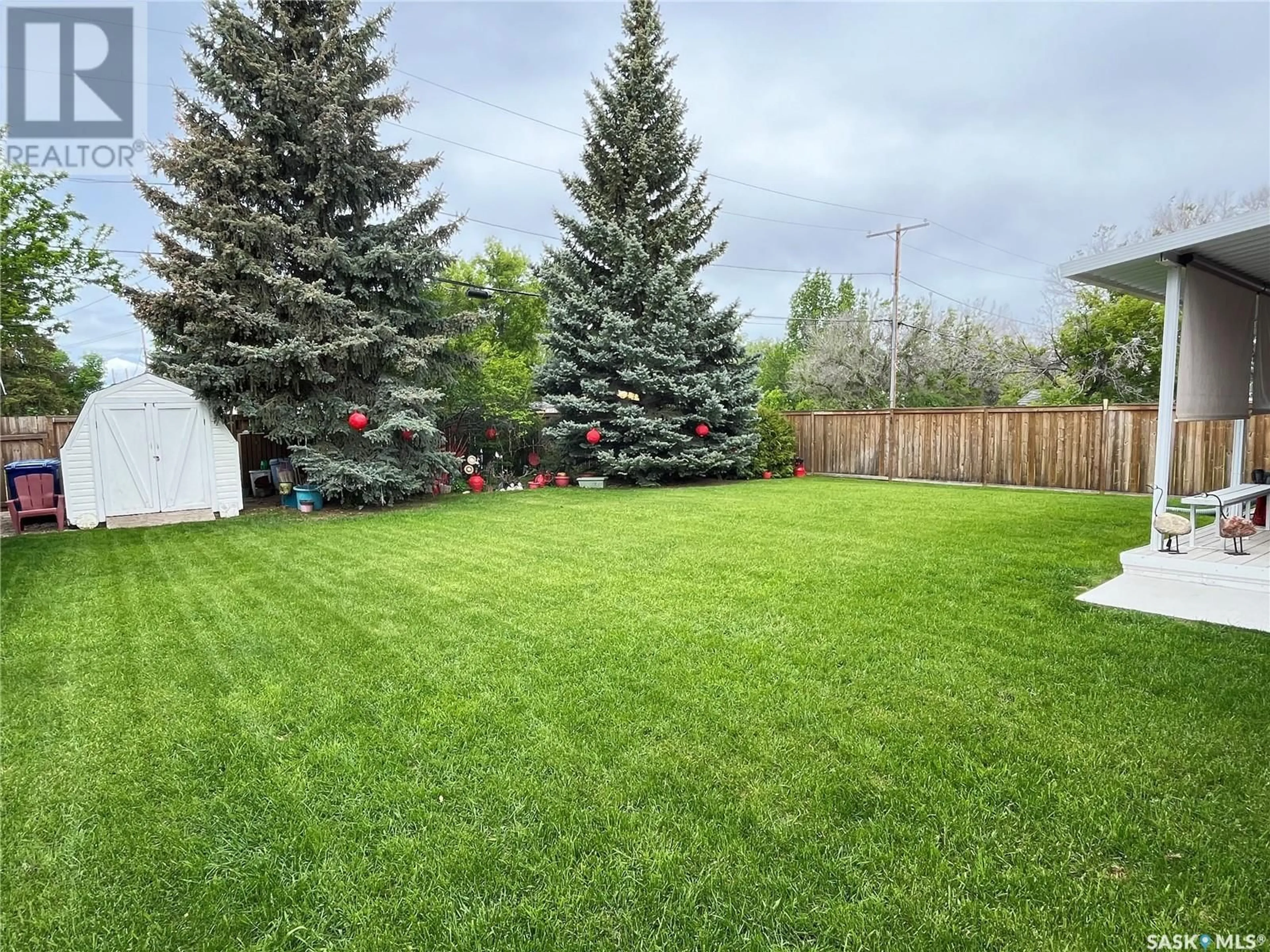 A pic from outside/outdoor area/front of a property/back of a property/a pic from drone, forest/trees view for 721 JASPER STREET, Maple Creek Saskatchewan S0N1N0