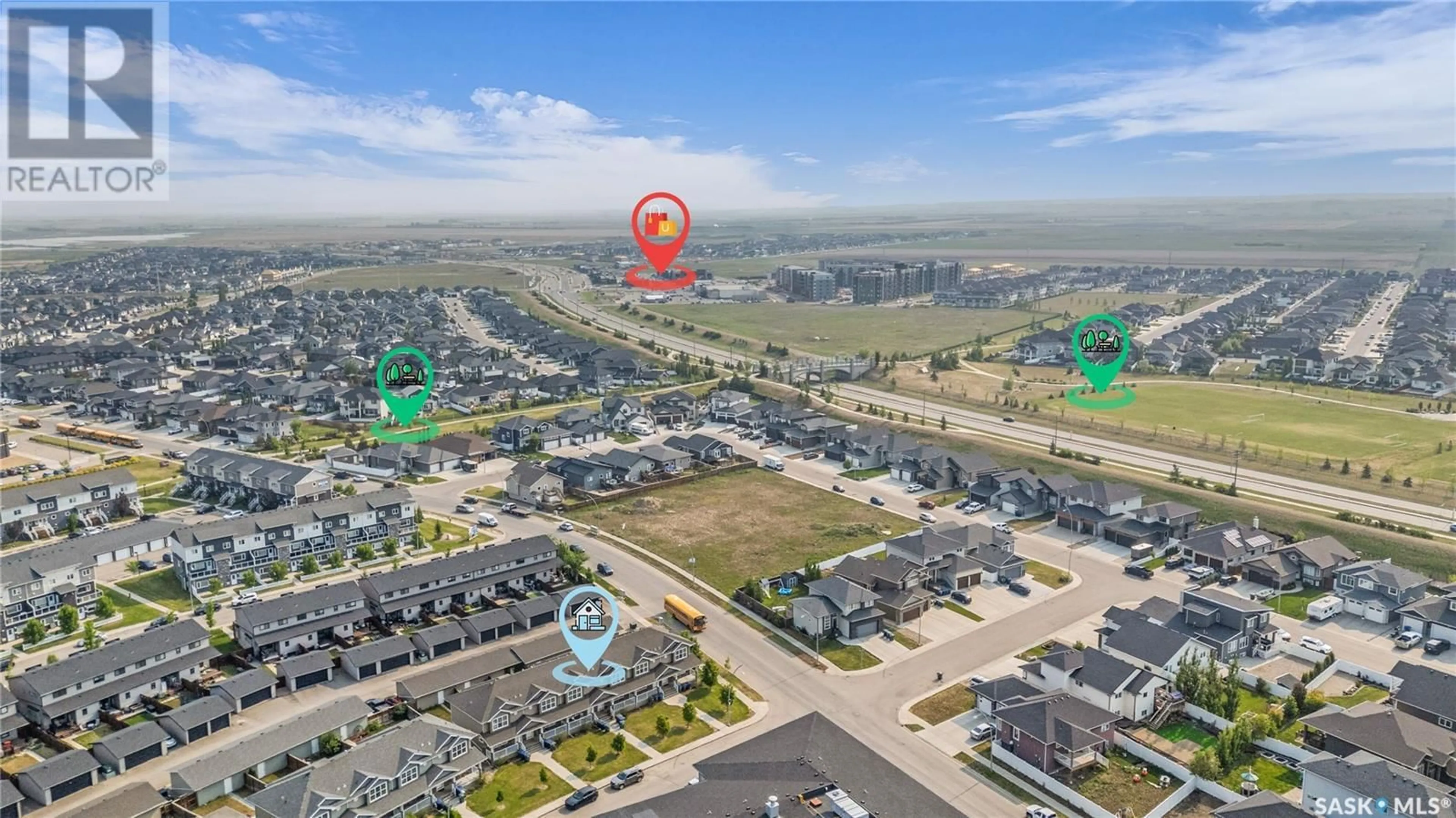 A pic from outside/outdoor area/front of a property/back of a property/a pic from drone, street for 428 MANINGAS BEND, Saskatoon Saskatchewan S7W0V6