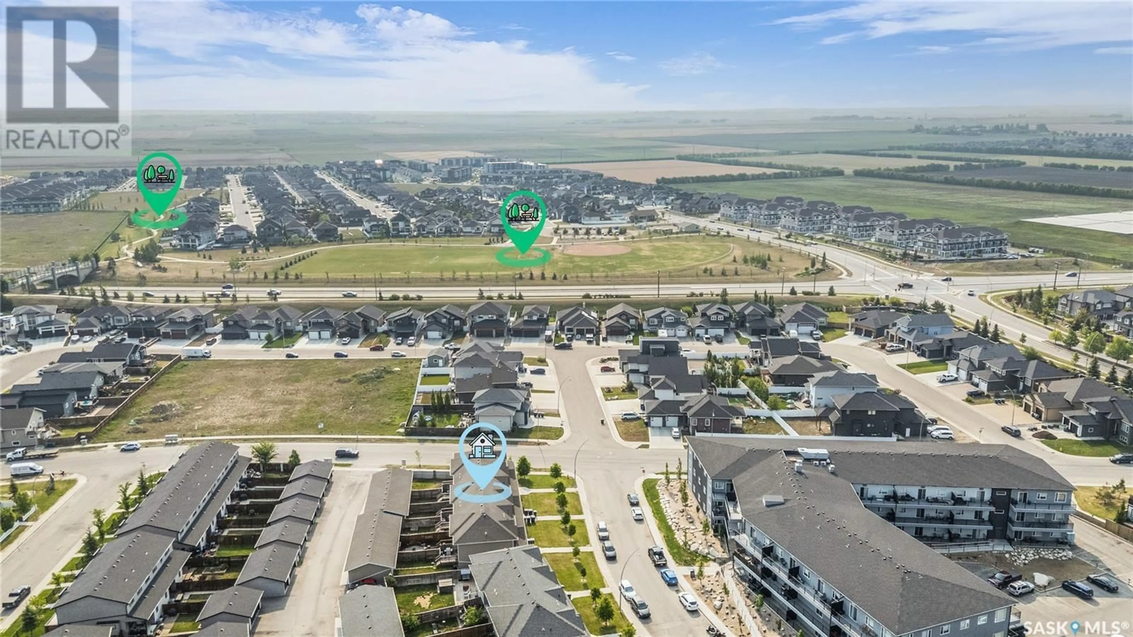 A pic from outside/outdoor area/front of a property/back of a property/a pic from drone, water/lake/river/ocean view for 428 MANINGAS BEND, Saskatoon Saskatchewan S7W0V6