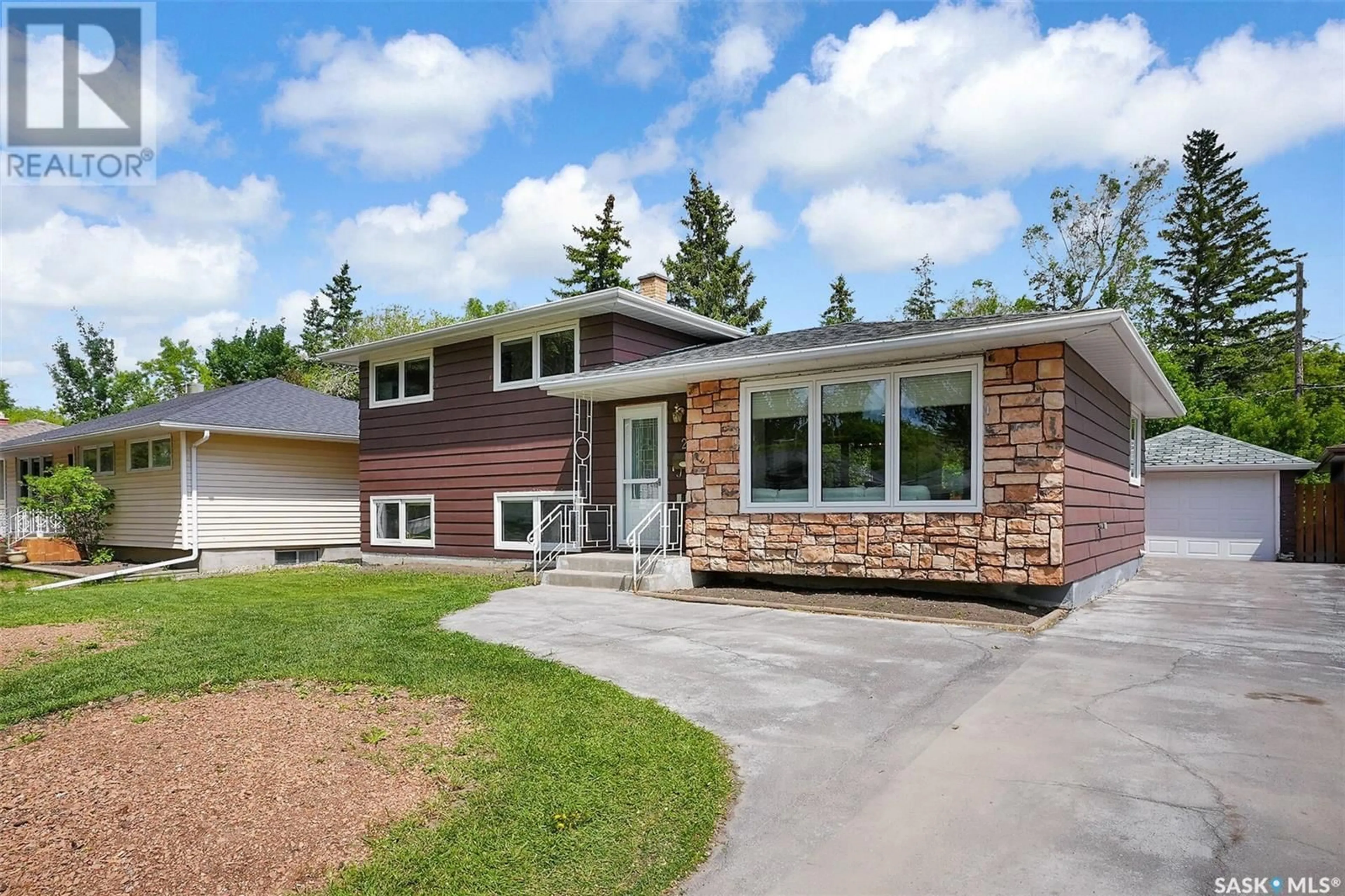 Home with brick exterior material, street for 25 PROBE STREET, Regina Saskatchewan S4R4V2