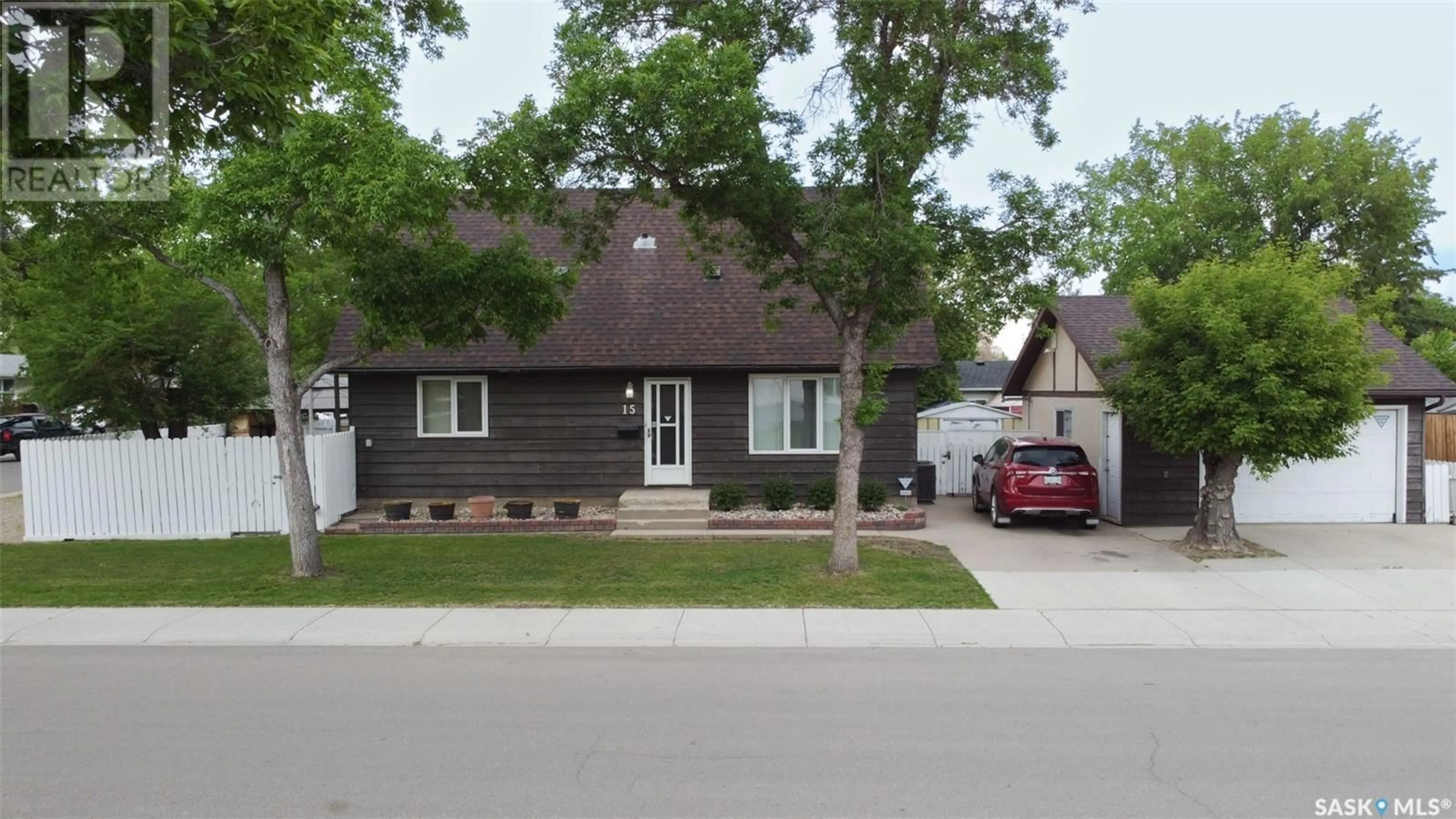 Home with vinyl exterior material, street for 15 HAYNEE STREET, Regina Saskatchewan S4N1P8