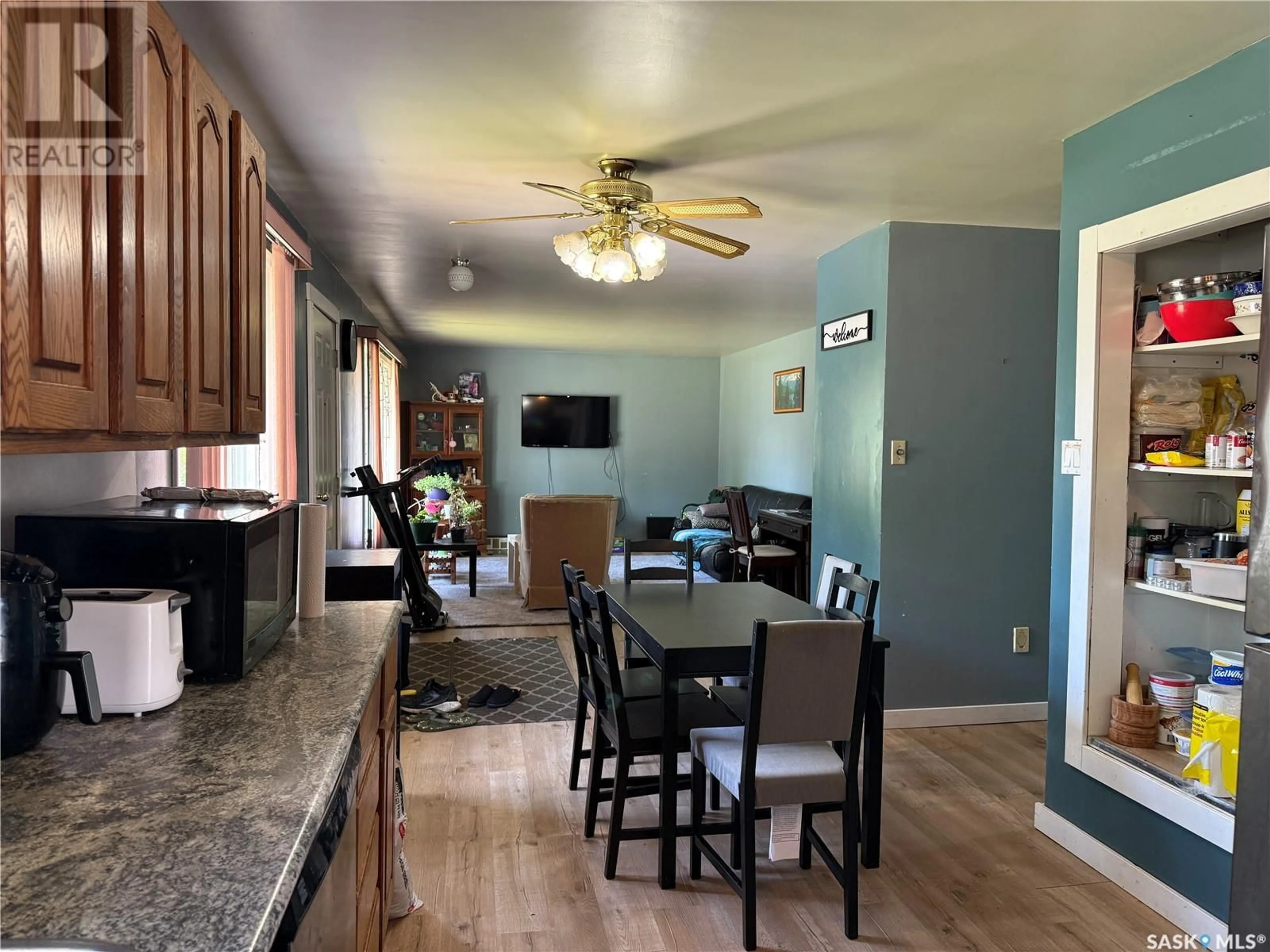 Open concept kitchen, wood/laminate floor for 518 3RD AVENUE, Meadow Lake Saskatchewan S9X1B3