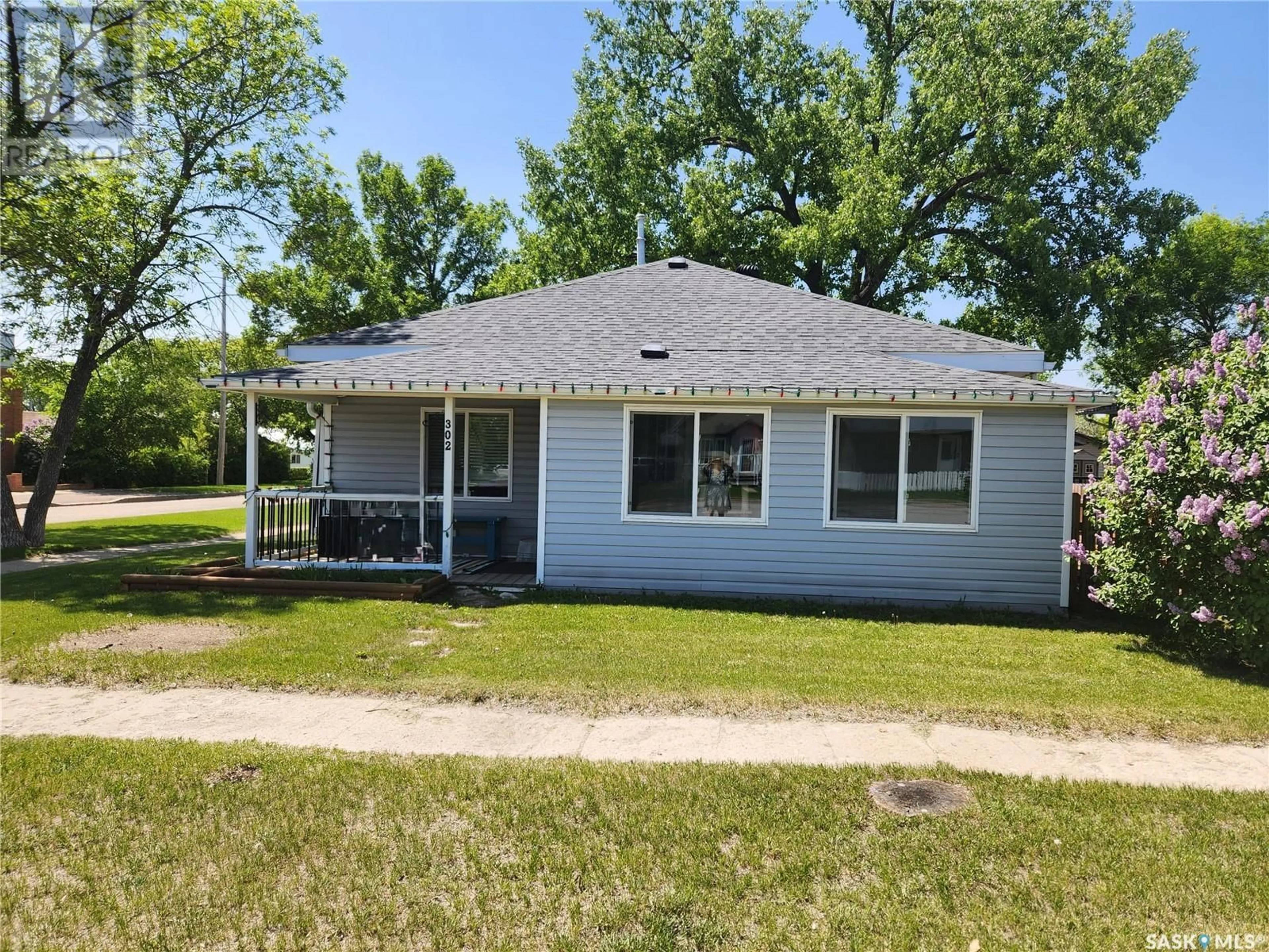 Home with vinyl exterior material, street for 302 MAIN STREET, Bienfait Saskatchewan S0C0M0