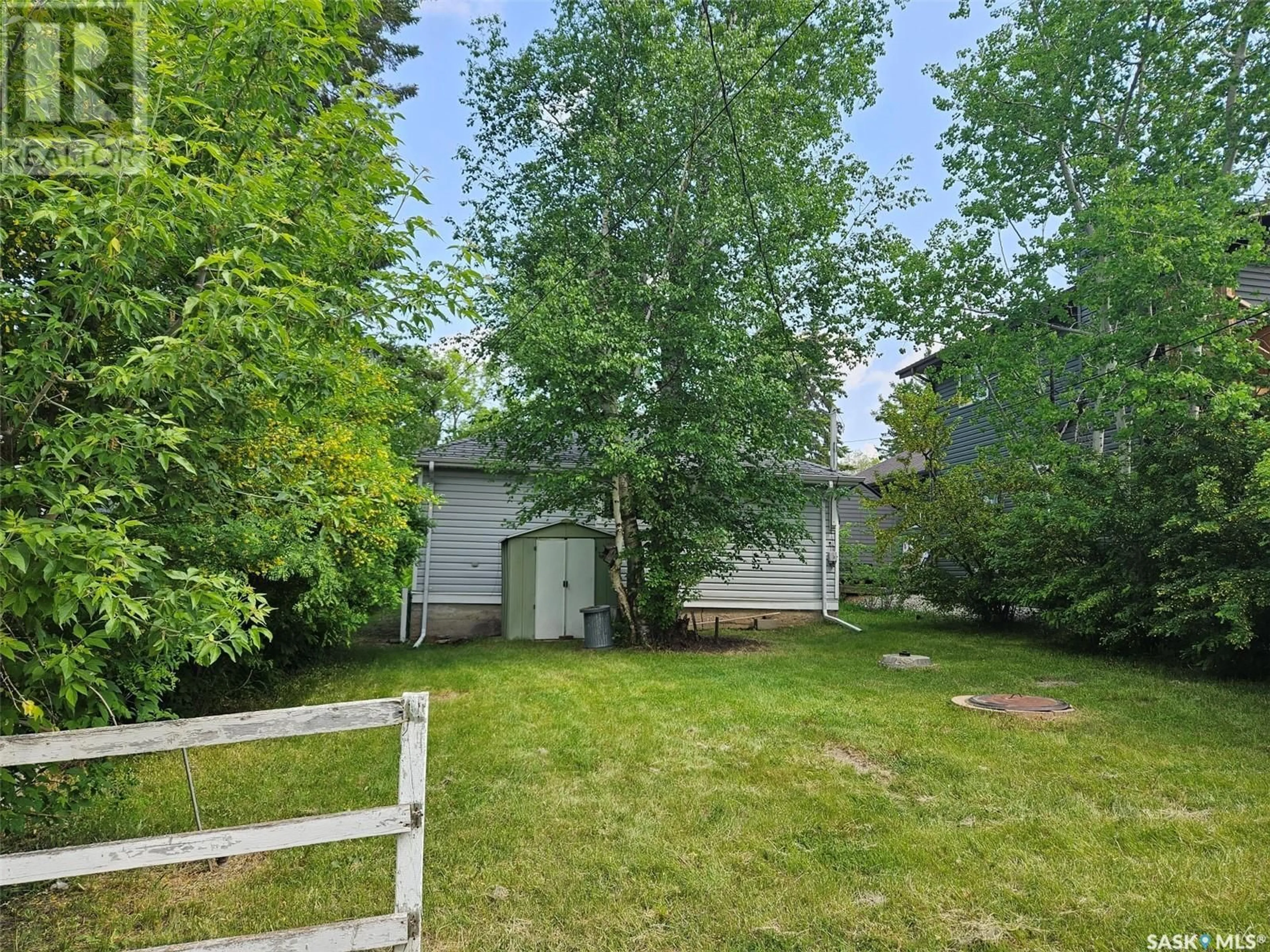 A pic from outside/outdoor area/front of a property/back of a property/a pic from drone, unknown for 20 OKADOCA STREET, Kenosee Lake Saskatchewan S0C2S0