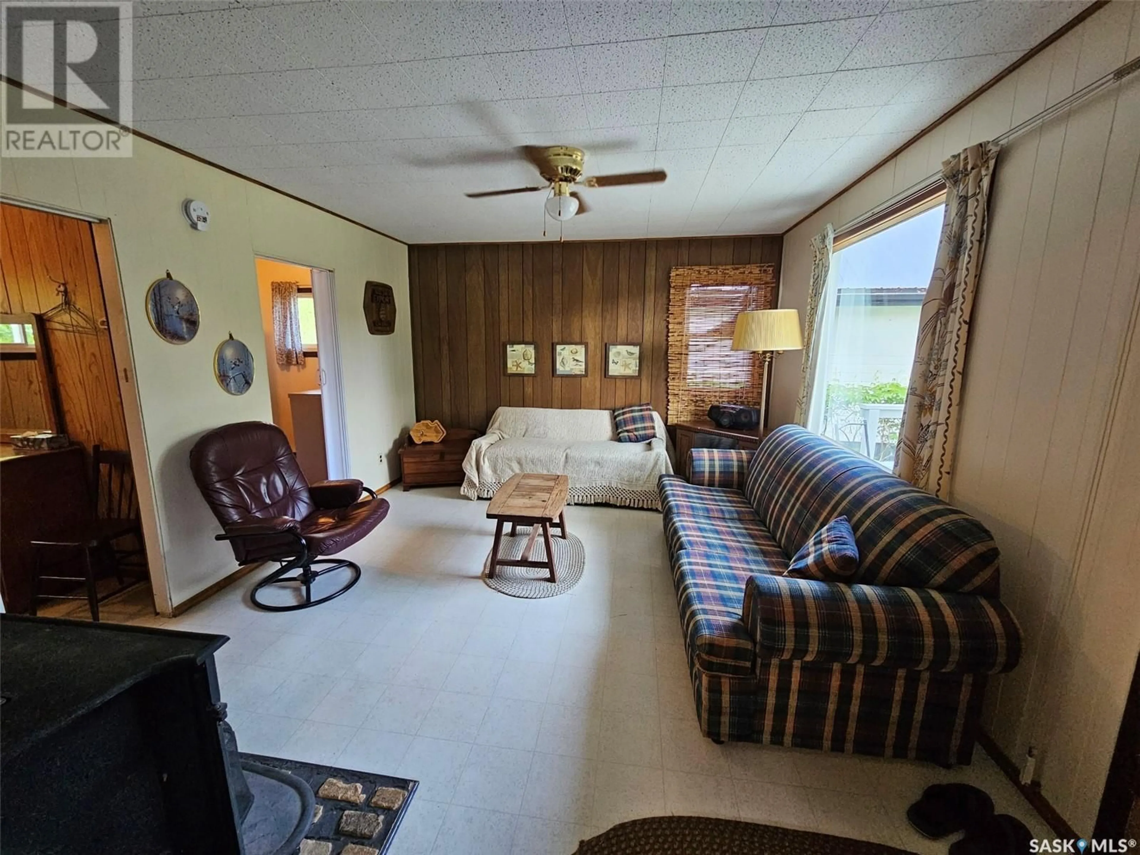 Living room with furniture, unknown for 20 OKADOCA STREET, Kenosee Lake Saskatchewan S0C2S0