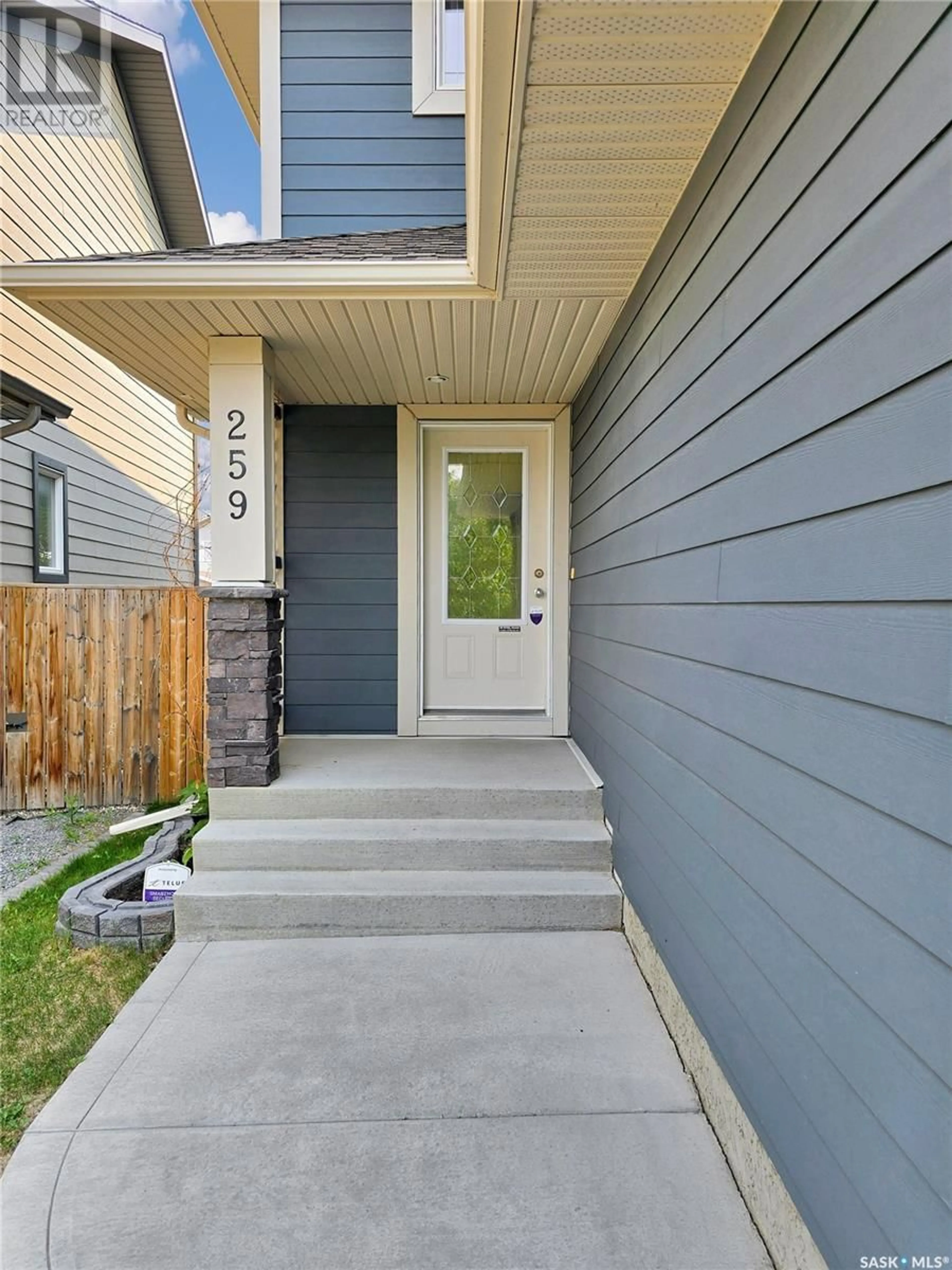 Home with vinyl exterior material, street for 259 MCBETH CRESCENT, Saskatoon Saskatchewan S7T0K5