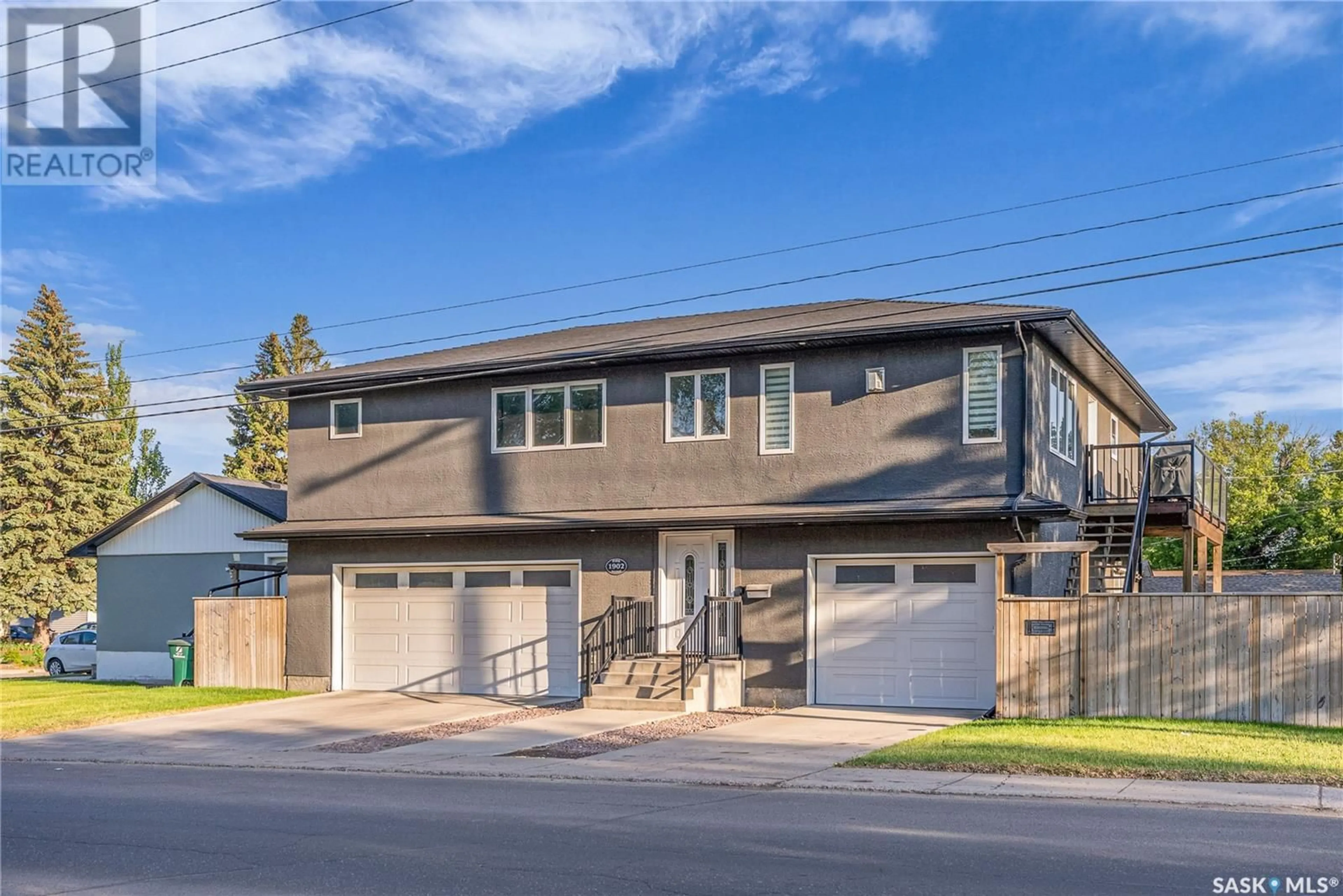 Home with vinyl exterior material, street for 1902 PARK AVENUE, Saskatoon Saskatchewan S7J2B9