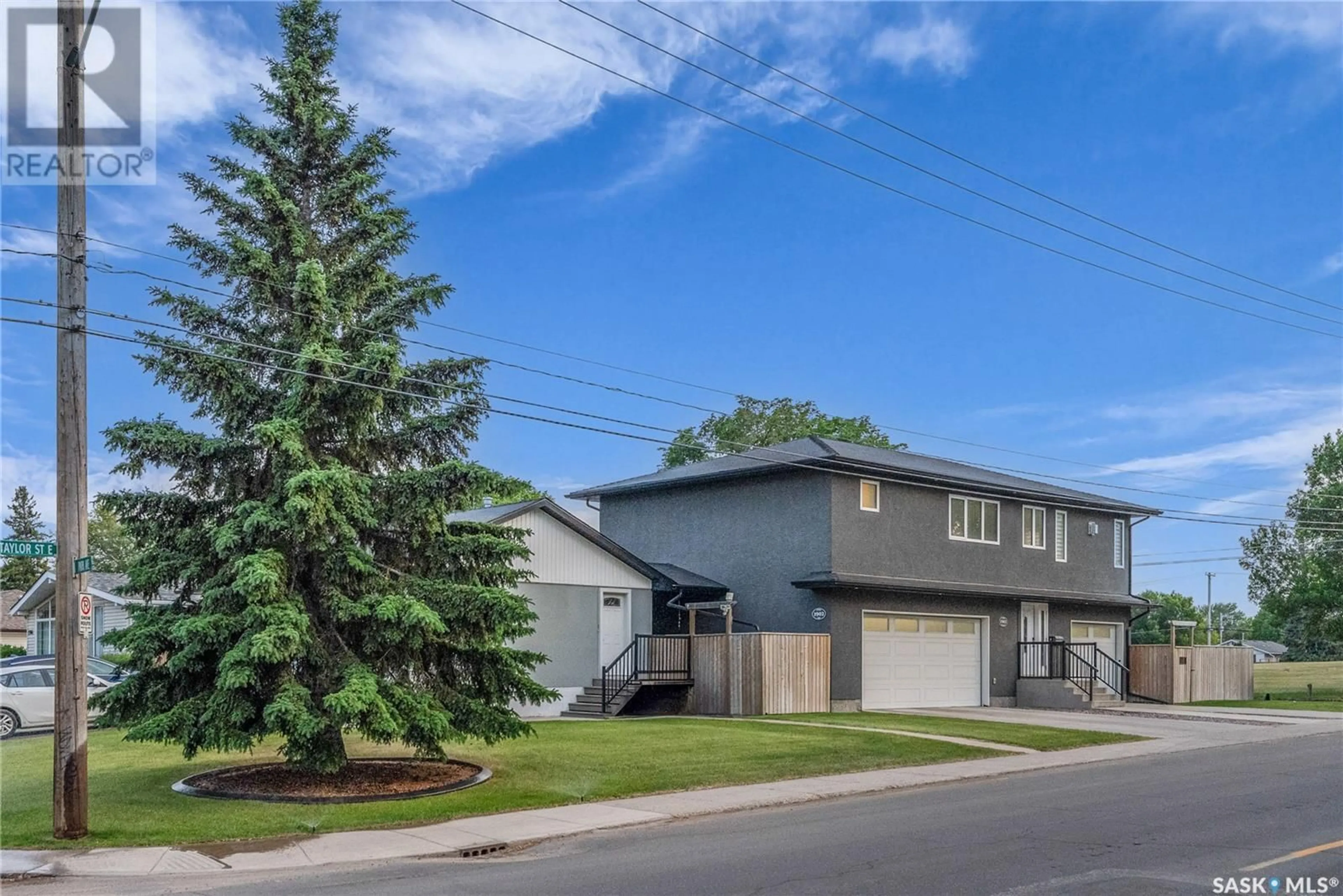 Home with vinyl exterior material, street for 1902 PARK AVENUE, Saskatoon Saskatchewan S7J2B9