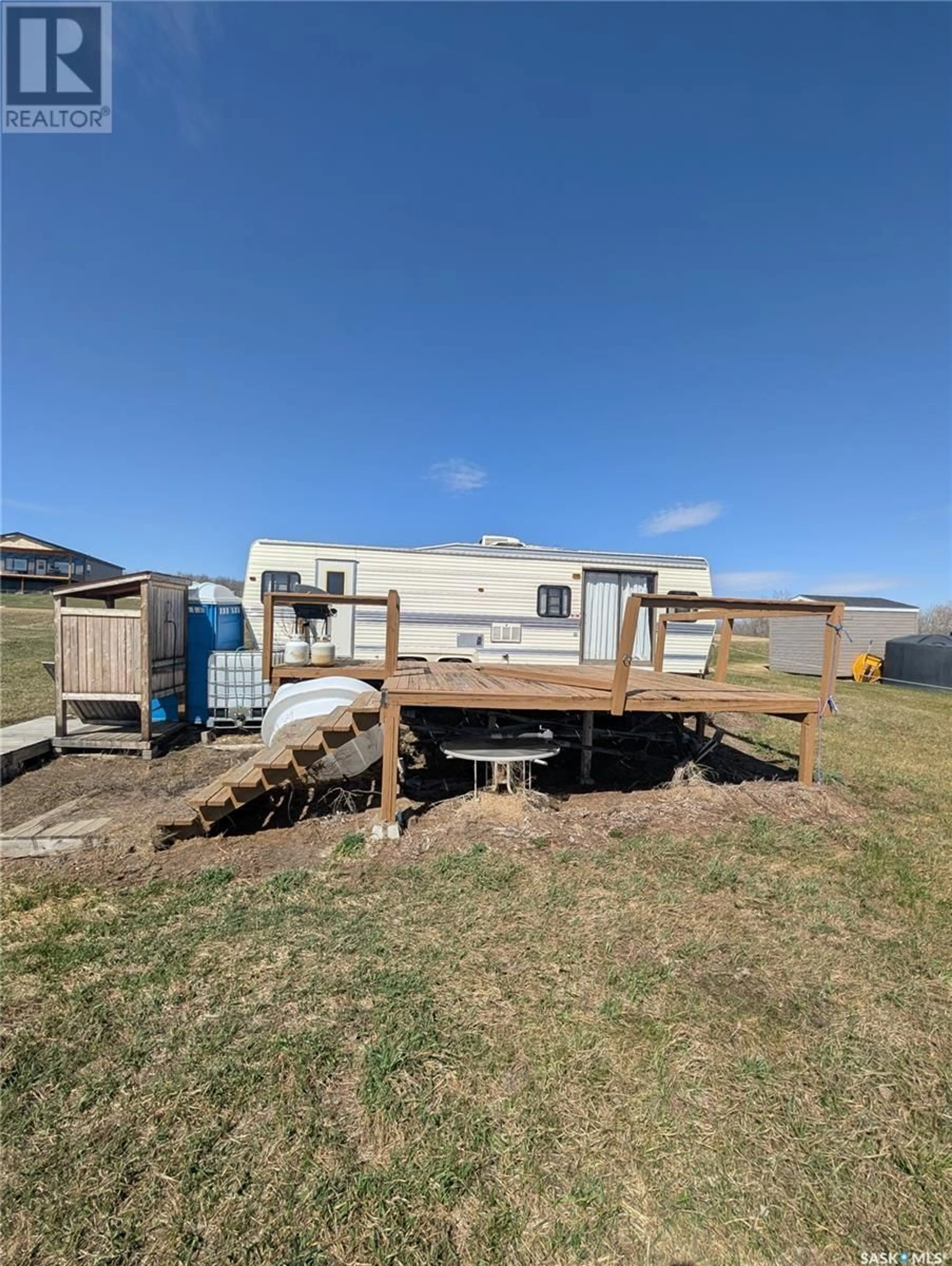 A pic from outside/outdoor area/front of a property/back of a property/a pic from drone, building for 232 BOUCHARD LANE, Invergordon Rm No. 430 Saskatchewan S0K1A0