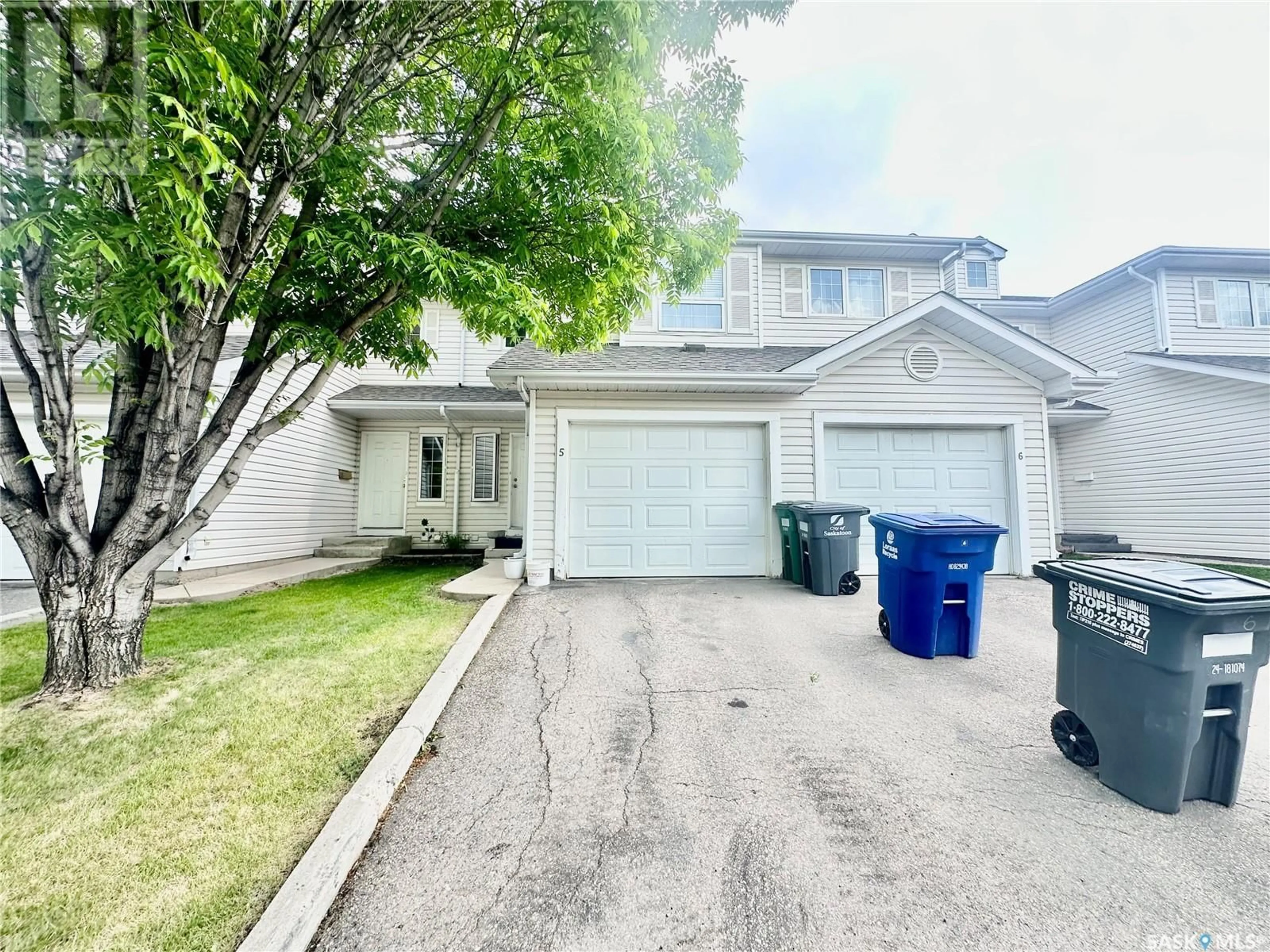 A pic from outside/outdoor area/front of a property/back of a property/a pic from drone, street for 410 - 5 KEEVIL CRESCENT, Saskatoon Saskatchewan S7N4R8