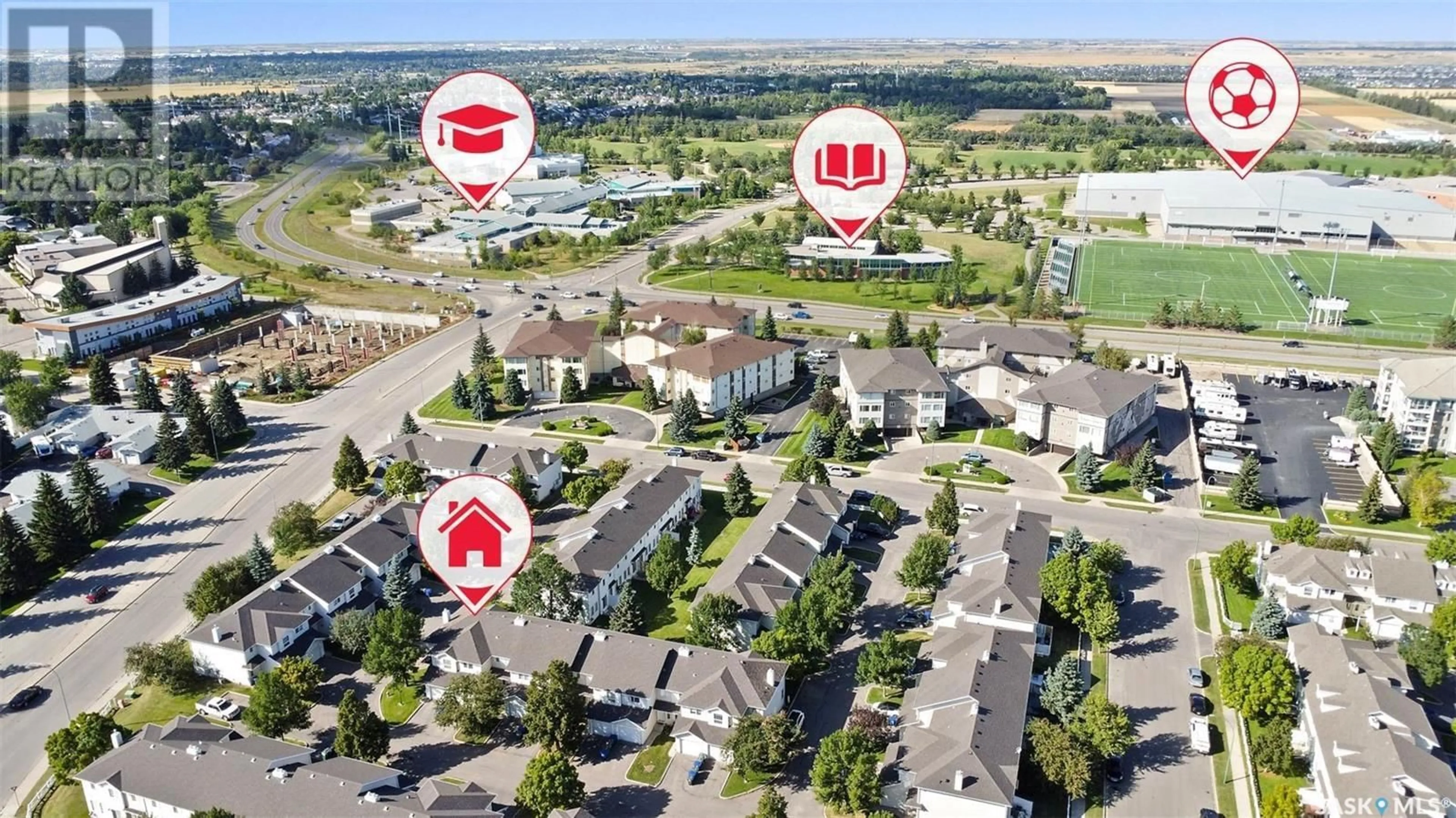 A pic from outside/outdoor area/front of a property/back of a property/a pic from drone, unknown for 410 - 5 KEEVIL CRESCENT, Saskatoon Saskatchewan S7N4R8