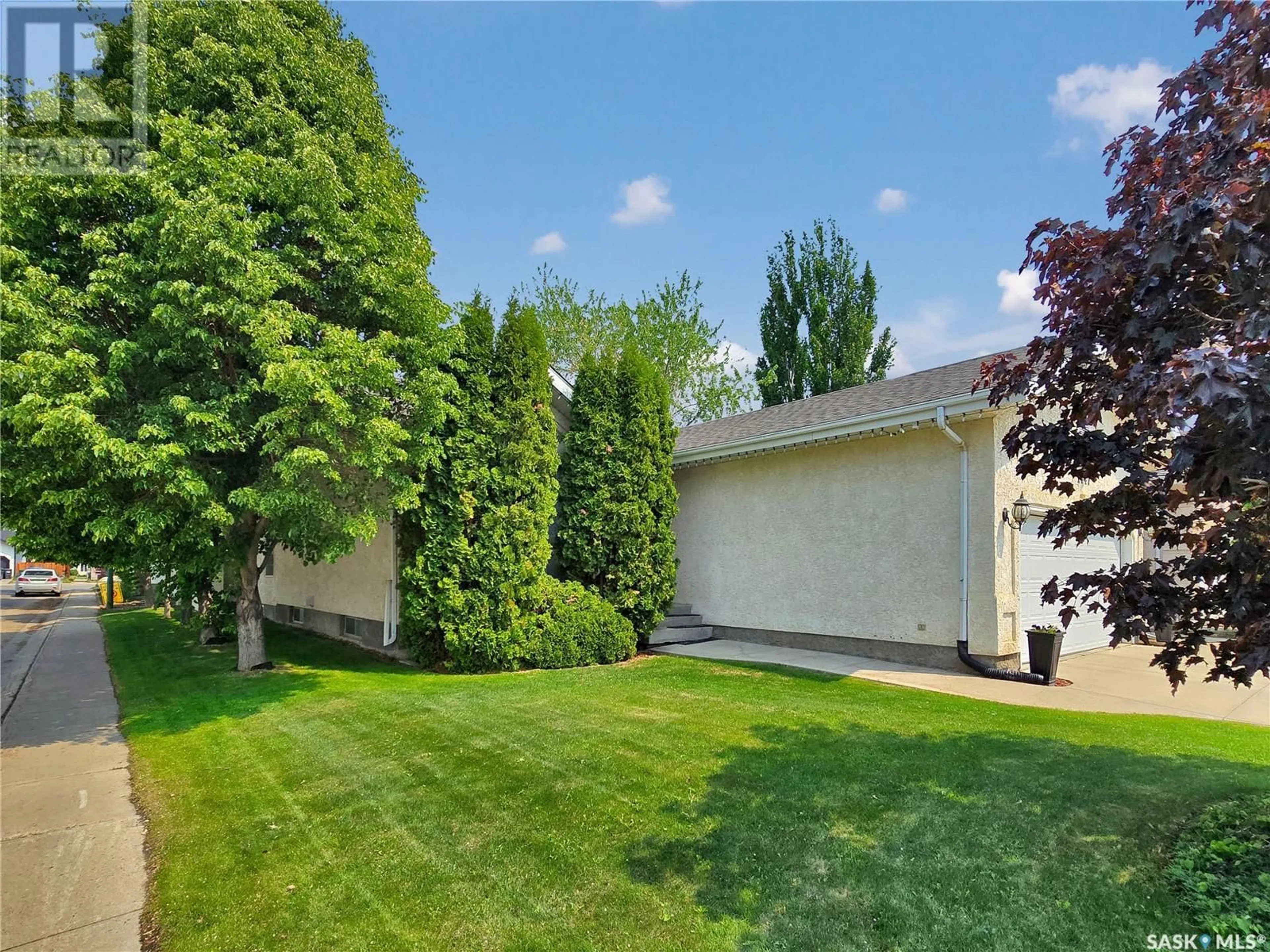 A pic from outside/outdoor area/front of a property/back of a property/a pic from drone, street for 1447 FAIRBROTHER CRESCENT, Saskatoon Saskatchewan S7S1H7