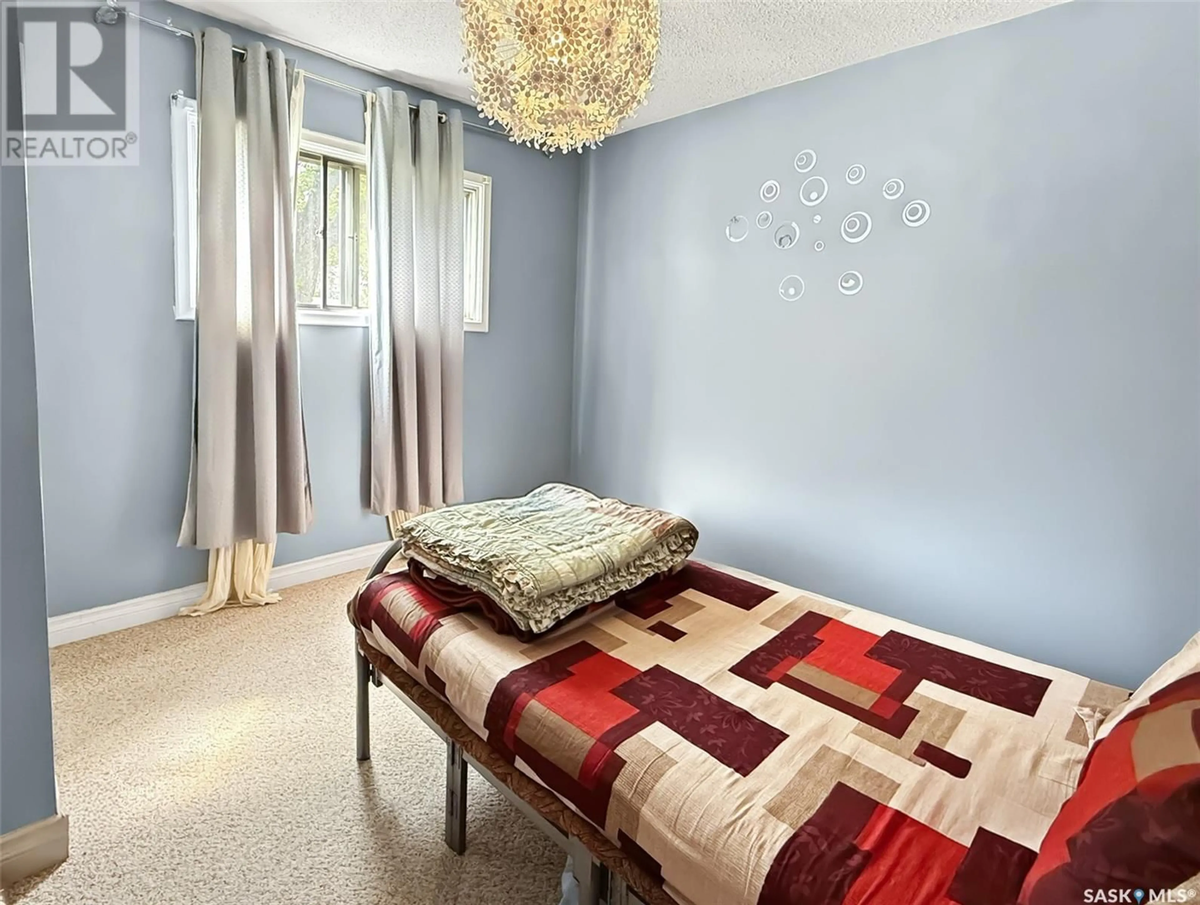 Bedroom with bed, carpet floor for 157 2ND AVENUE, Swift Current Saskatchewan S9H3H9