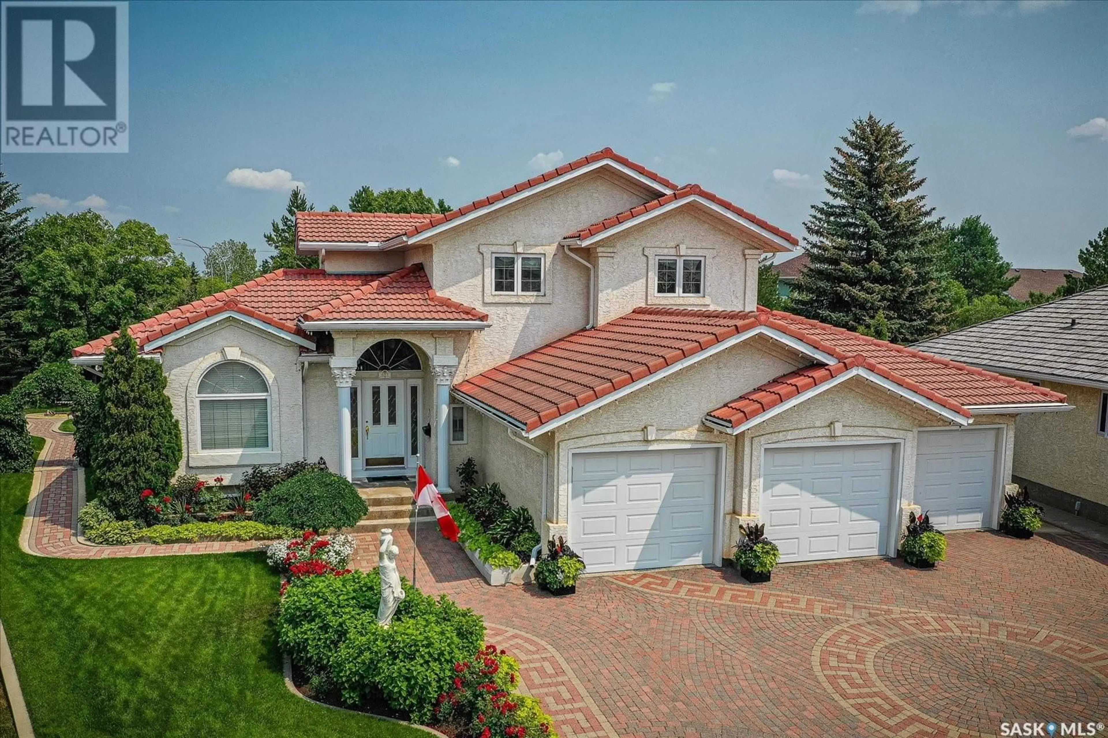 Home with brick exterior material, street for 922 BRAESIDE PLACE, Saskatoon Saskatchewan S7K1X5